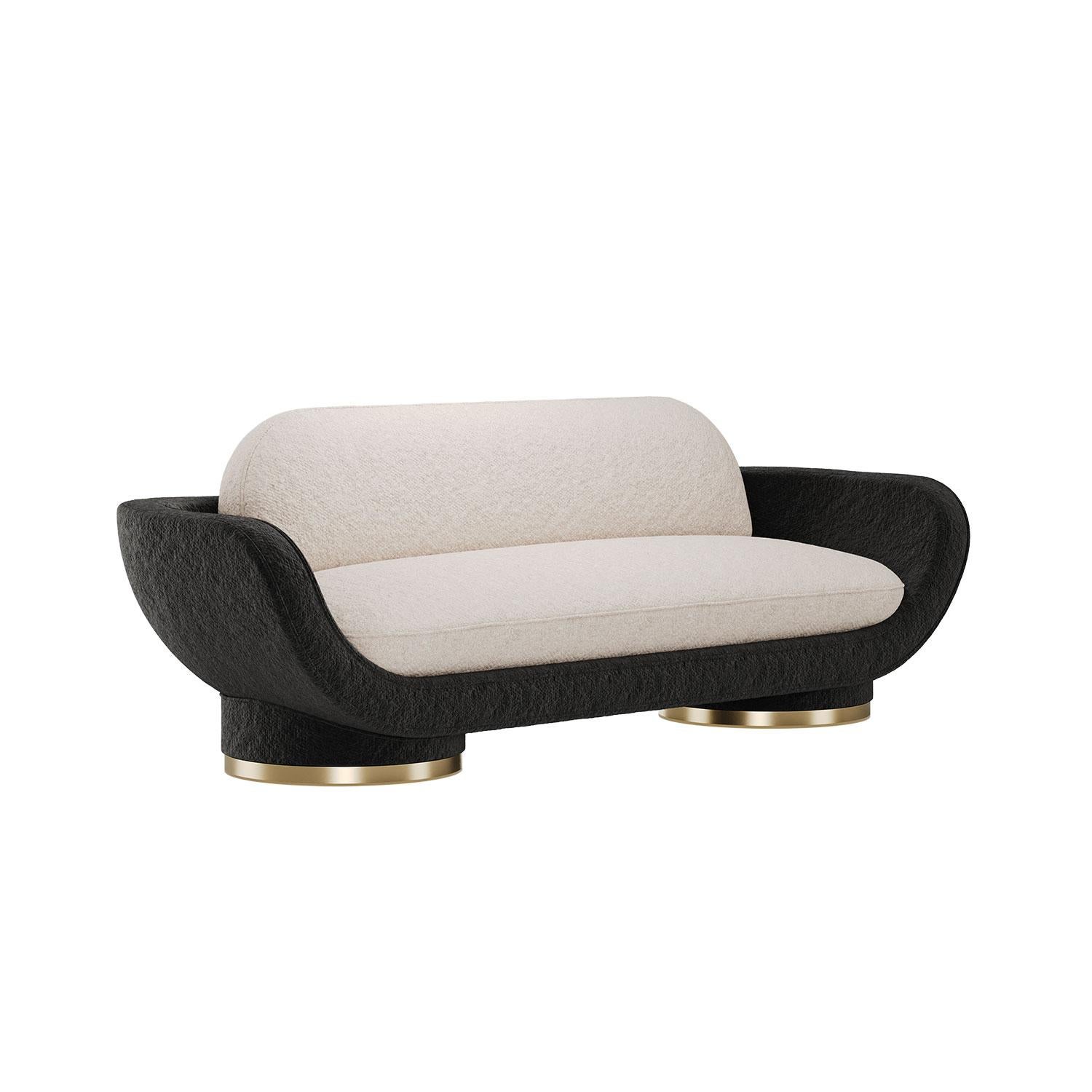 Evoking a bold and charismatic presence, the Conde Sofa showcases a robust, geometric profile, softened by gentle curves that add architectural lightness to the sofa’s visual weight. The design nature of its deep seat and backrest allows for