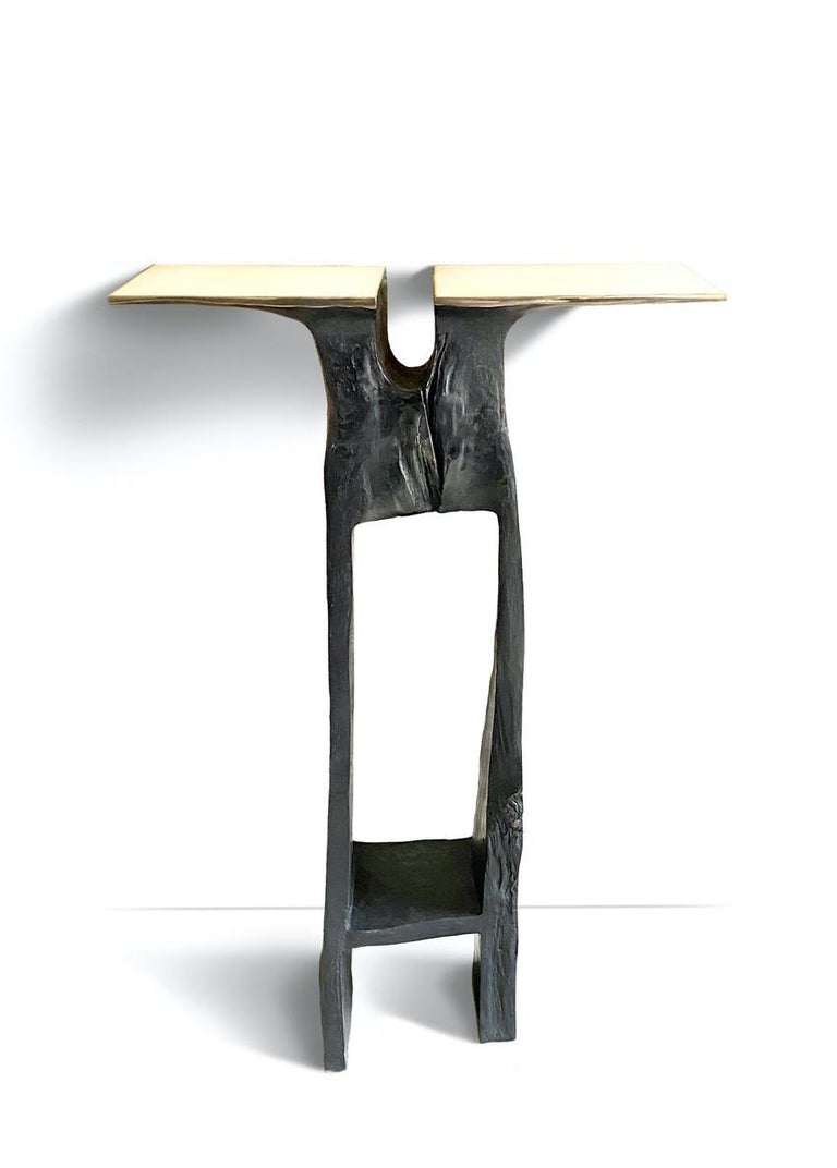 21st century console pedestal Atlante by Adrien Coroller

Bronze 
Customizable
Numeroted 1/8, signed and delivered with a certificate of authenticity

The tray and the base are directly cut with and around the defects of a pear tree log. The