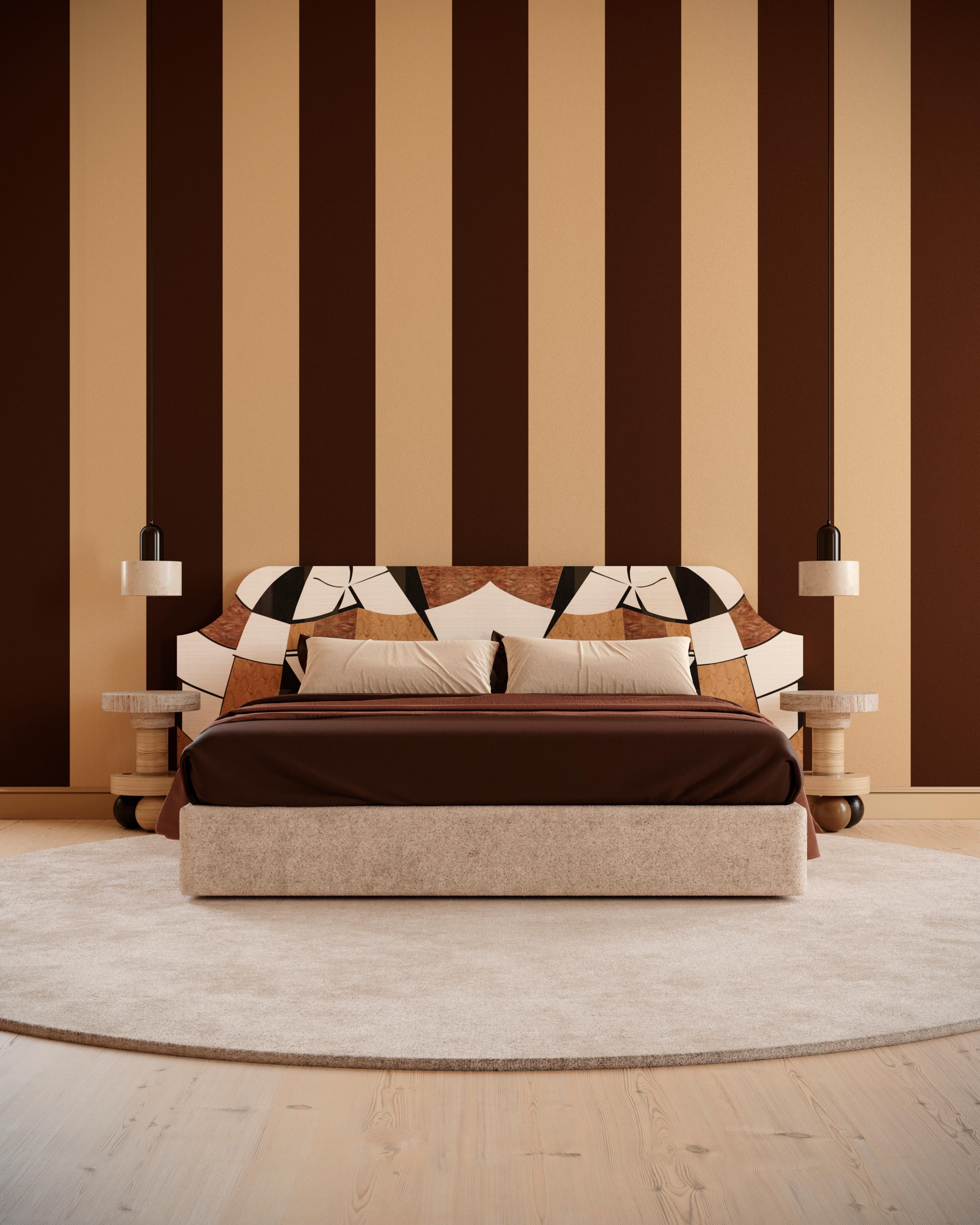 Austria Bed, where the timeless art of marquetry meets contemporary aesthetics. Its statement modern bed design with a meticulously crafted headboard in the ancestral art of marquetry exudes elegance and sophistication. With a seamless blend of wood
