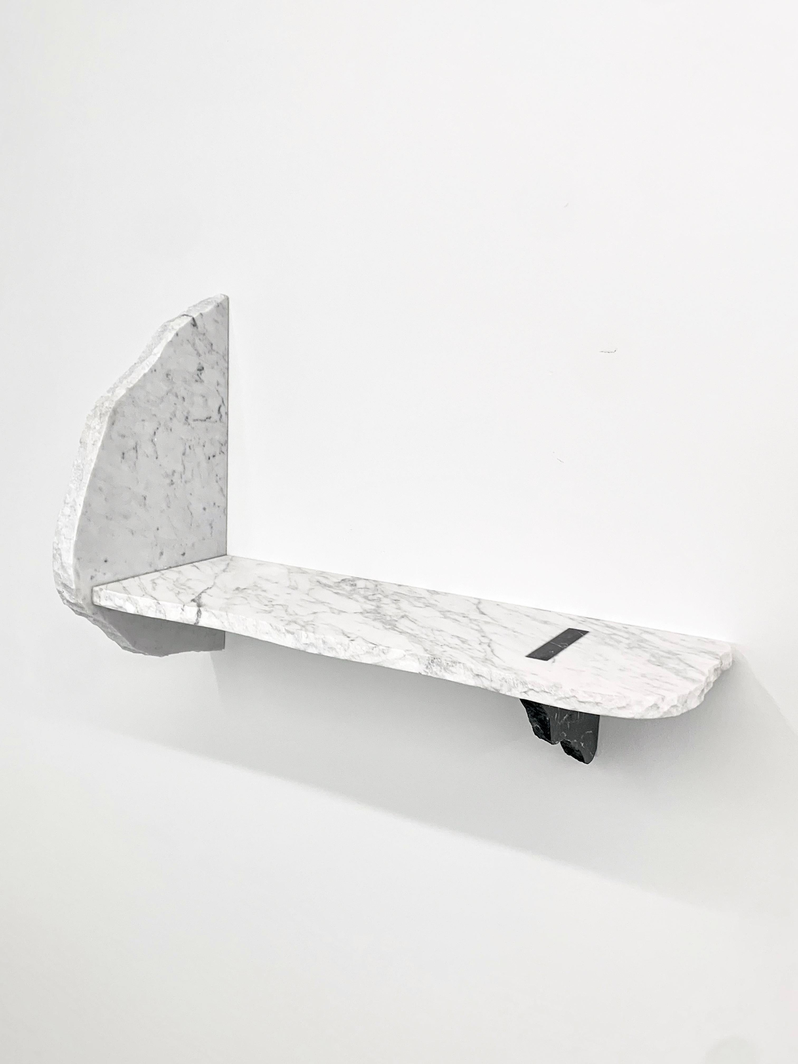 Carrara and Marquinia Marble
Handmade in Italy
As shown 60x40x24 cm 

This one-of-a-kind design shelf is completely handmade with salvaged marble elements from the production cycle. Duo Shelf is a product of sustainable design promoting circular