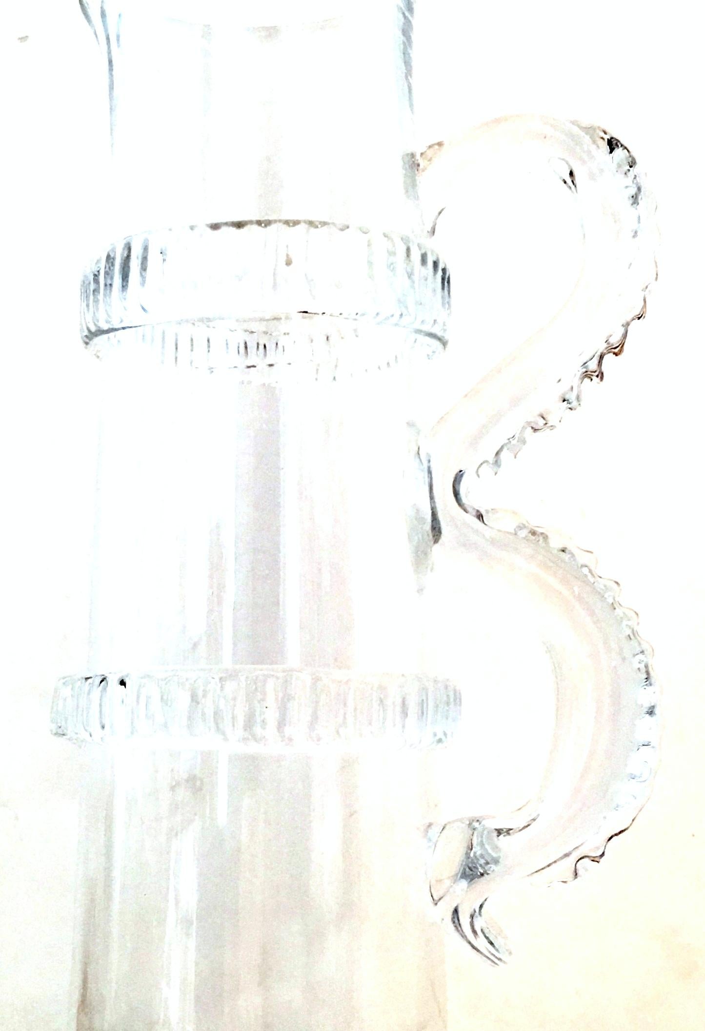 21st century contemporary and new cut to clear crystal faux bamboo motif with applied handle beverage pitcher.