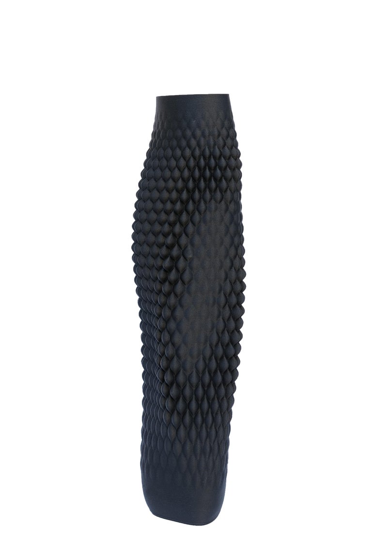 Named after the designer's memory of a trip to India, the India vase's elegant shape is the result of the symbiosis between the emerging 3D print technology and Italian craftsmanship. 

Made of a biodegradable non-toxic thermoplastic derived from