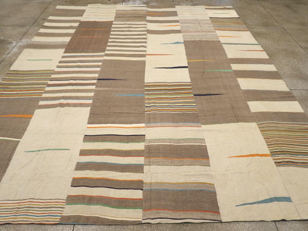 A modern Turkish flatweave Kilim room size carpet handmade during the 21st century.

Measures: 11' 7