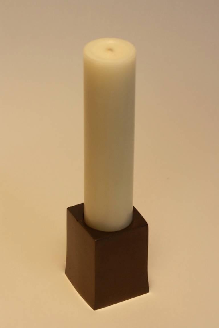 An original design by Scott Gordon and sold exclusively through Vermontica, the block candleholder is made from cast steel and holds a 2