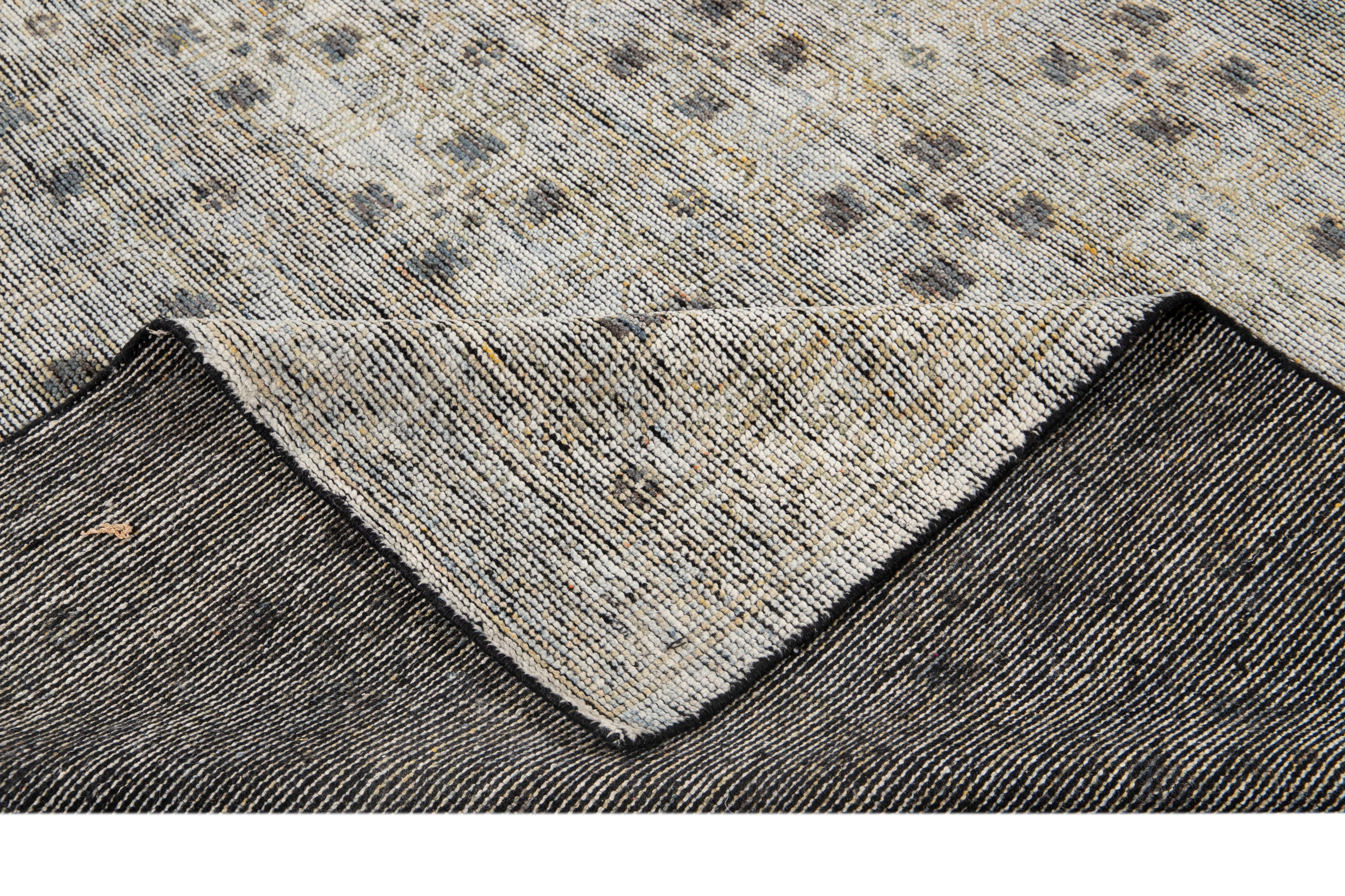 Beautiful Modern Soumak Style Distressed Indian Rug, hand-knotted wool with a gray field, dark gray and tan accents, and all-over geometric design. 

This rug measures 8' 4