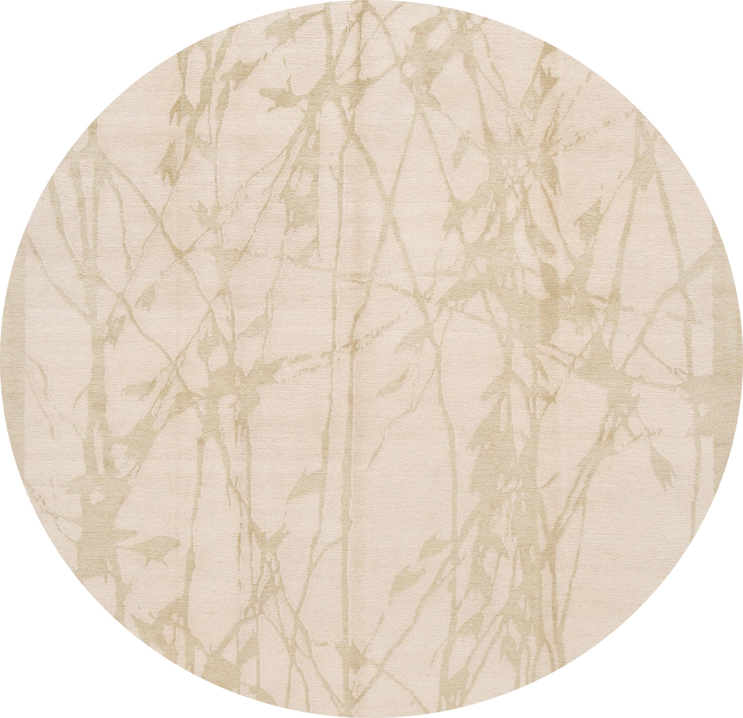 Un magnifique tapis tibétain contemporain noué à la main, avec un champ ivoire et des accents havane, le tout dans un design contemporain.
Ce tapis mesure 8' x 9'11