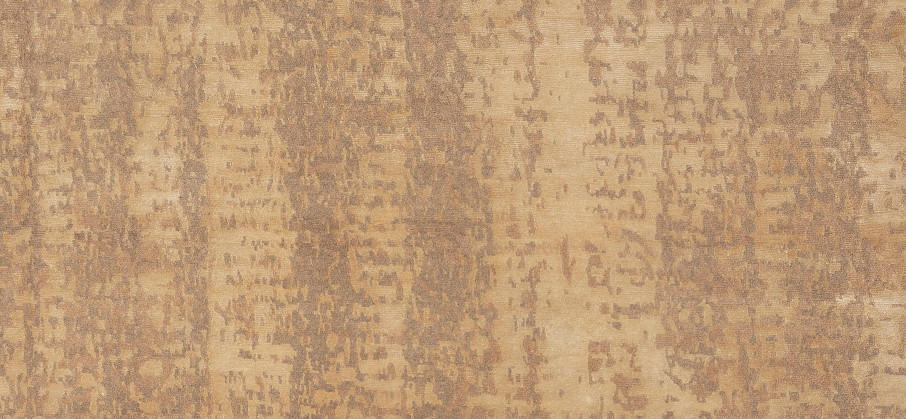 Enhance your home with this beautiful contemporary rug, meticulously handcrafted in Nepal. This exquisite piece features a stunning array of tones, creating a visually captivating centerpiece for any room. The blend of premium fibers offers an