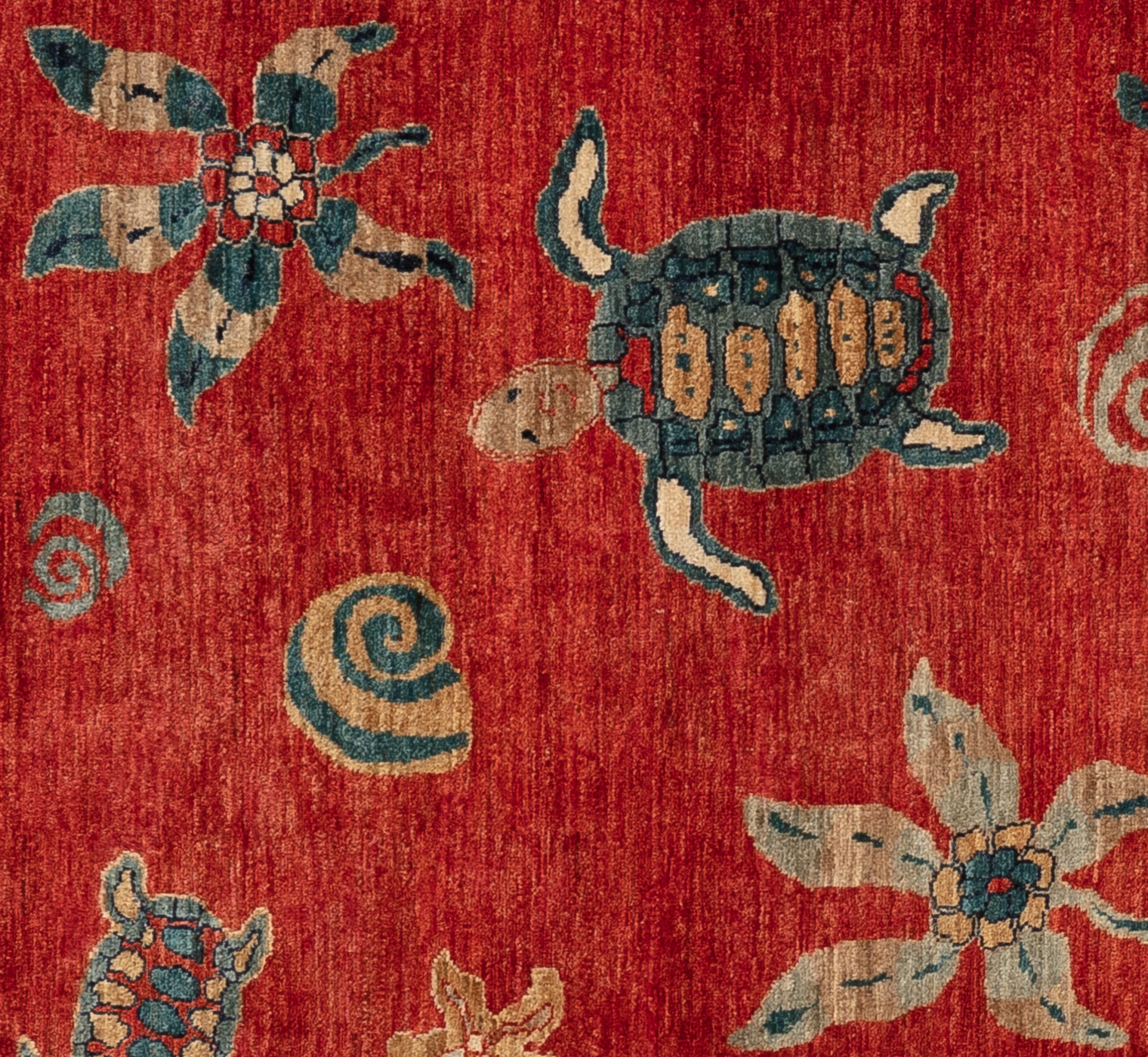 Elevate your living space with the captivating allure of the sea embodied in this stunning contemporary sea life rug, crafted from the finest wool sourced from the artisanal hubs of India. Inspired by the wonders of the ocean, this rug effortlessly