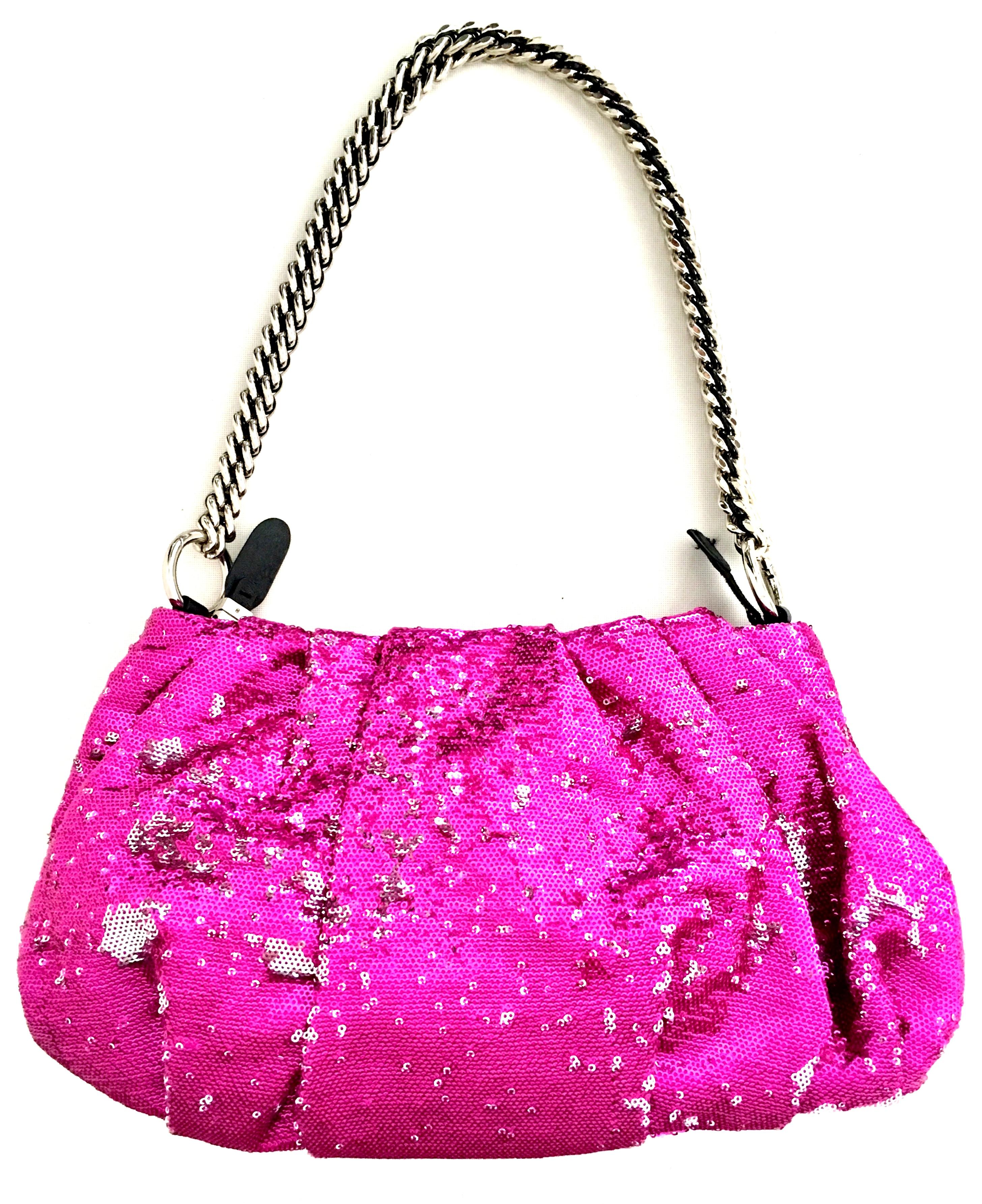 21st Century Contemporary Silver & Fuchsia Reversible Sequin Leather and Chrome Shoulder or Clutch Hand Bag By,  OR Yanny. This new and never used hand bag features a silver chrome and leather chain link removable shoulder strap, The 