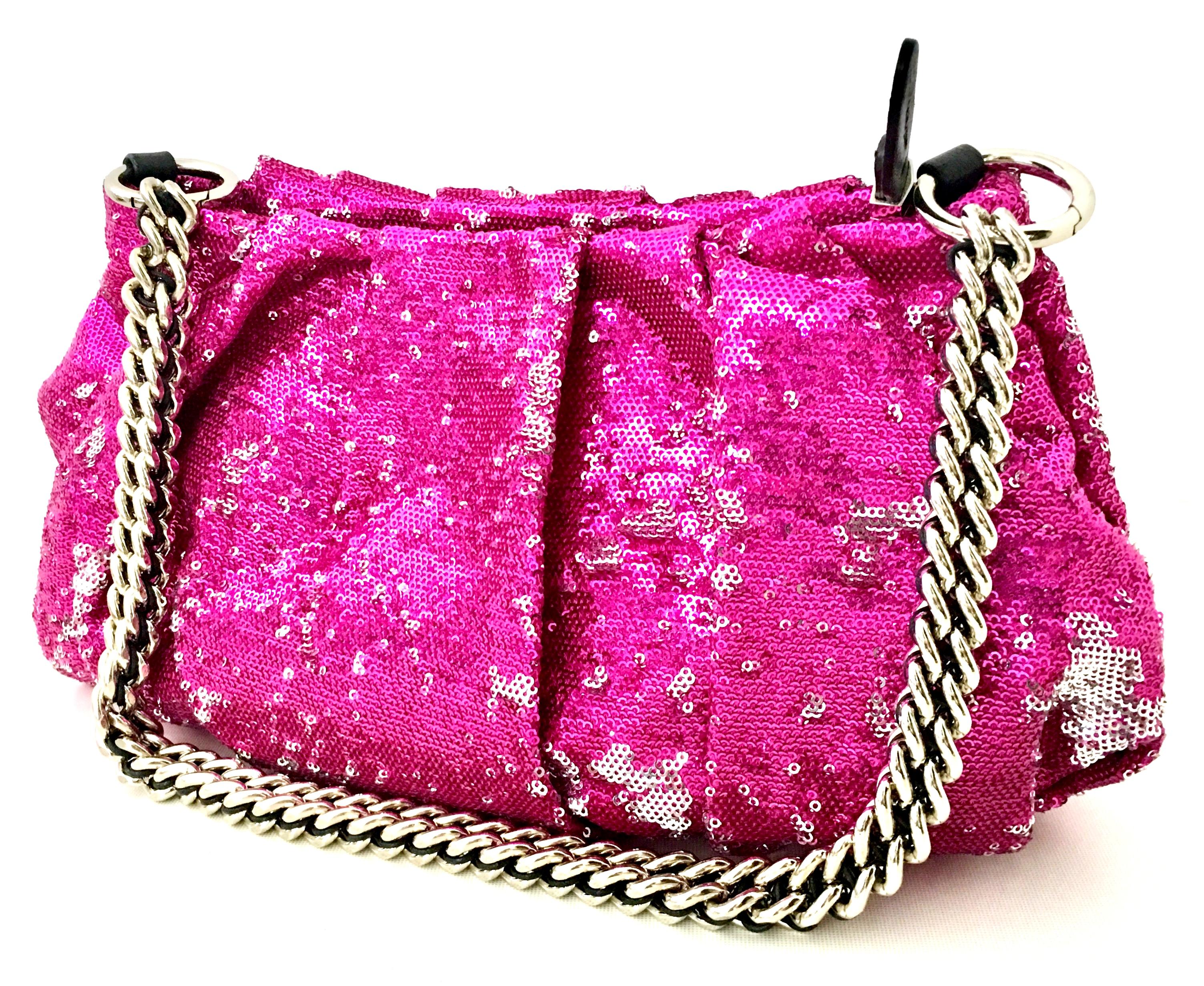 21st Century Contemporary Silver & Fuchsia Reversible Sequin Leather and Chrome Shoulder or Clutch Hand Bag By,  ORYanny. This new and never used hand bag features a silver chrome and leather chain link removable shoulder strap, The 