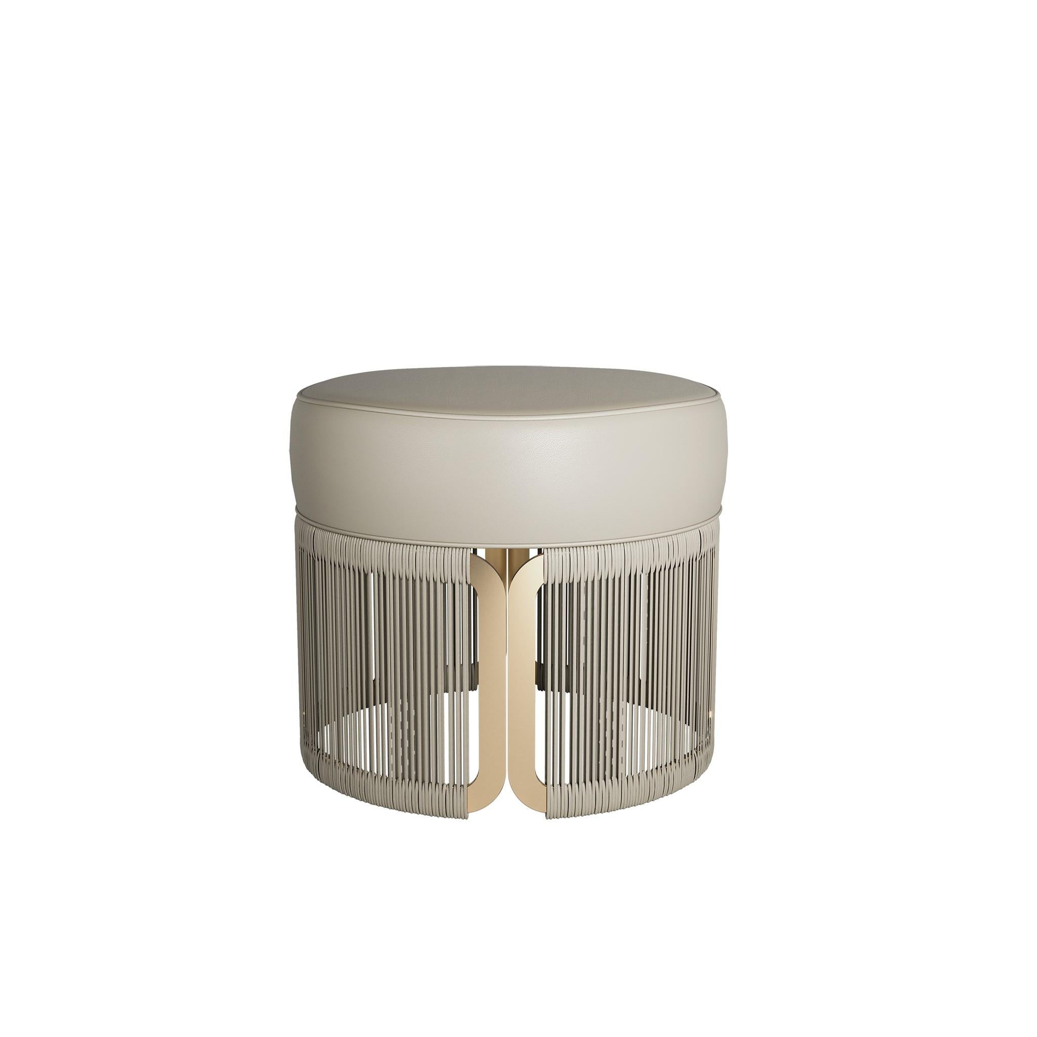 Manu Stool is a handmade lavish leather-upholstered piece. A modern stool with a design base of mesmerizing metalwork finished in glorious gold makes it the perfect choice to adorn a living area.

Materials: Upholstered in Leather;
Base in Gold