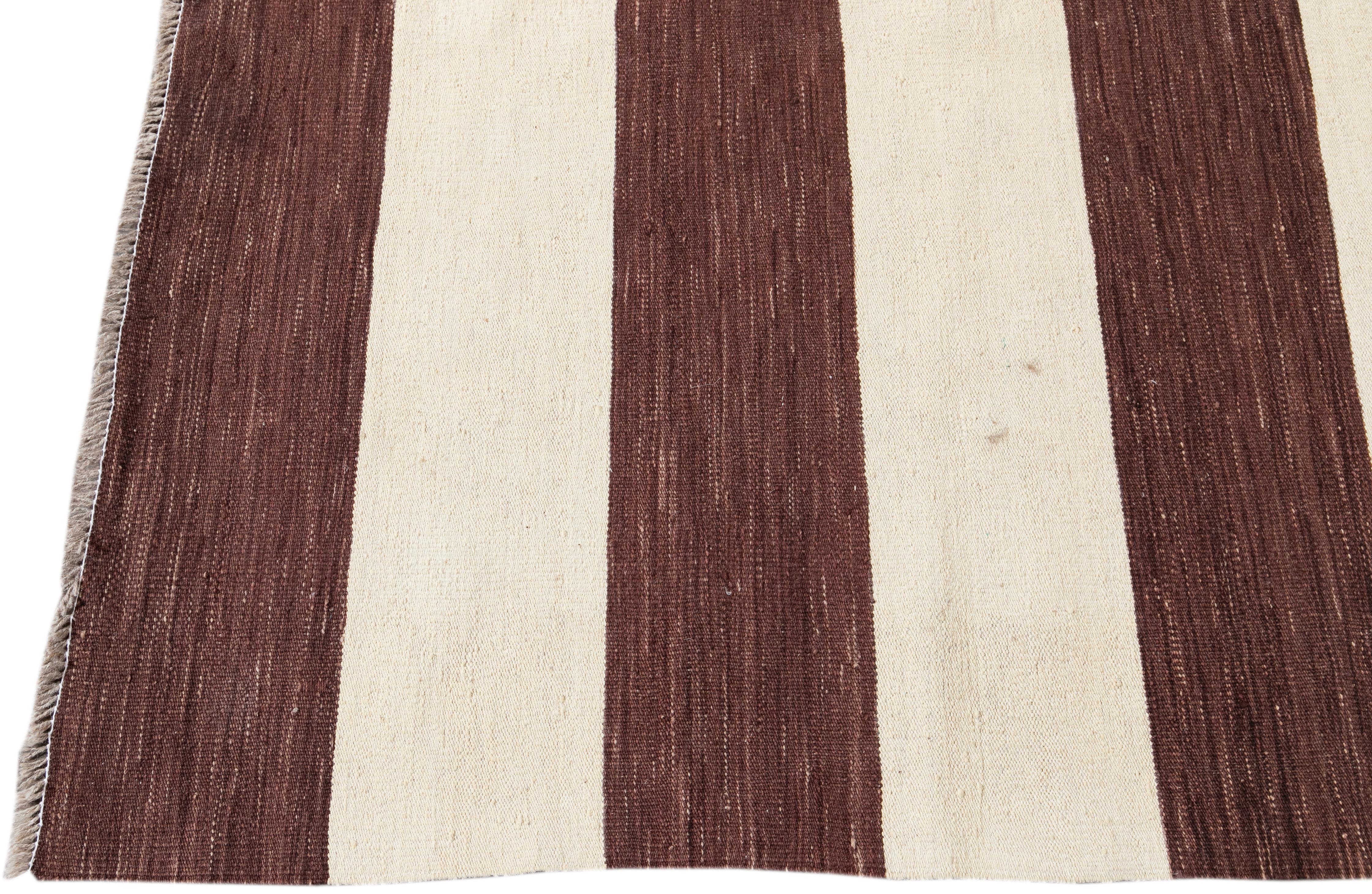 brown and white striped rug