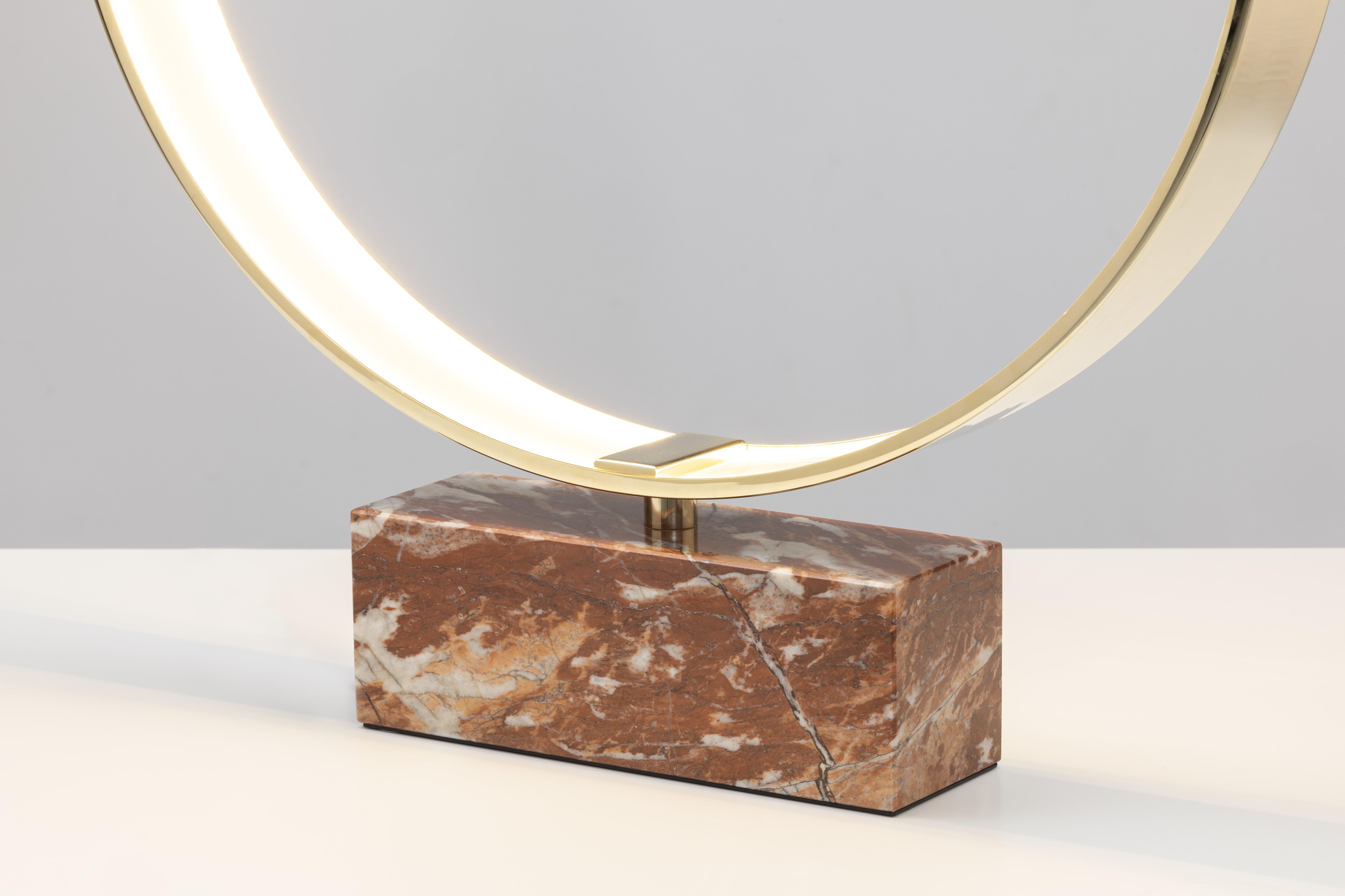A light ring of nuanced brightness, for a sensory experience of astral glossiness.
