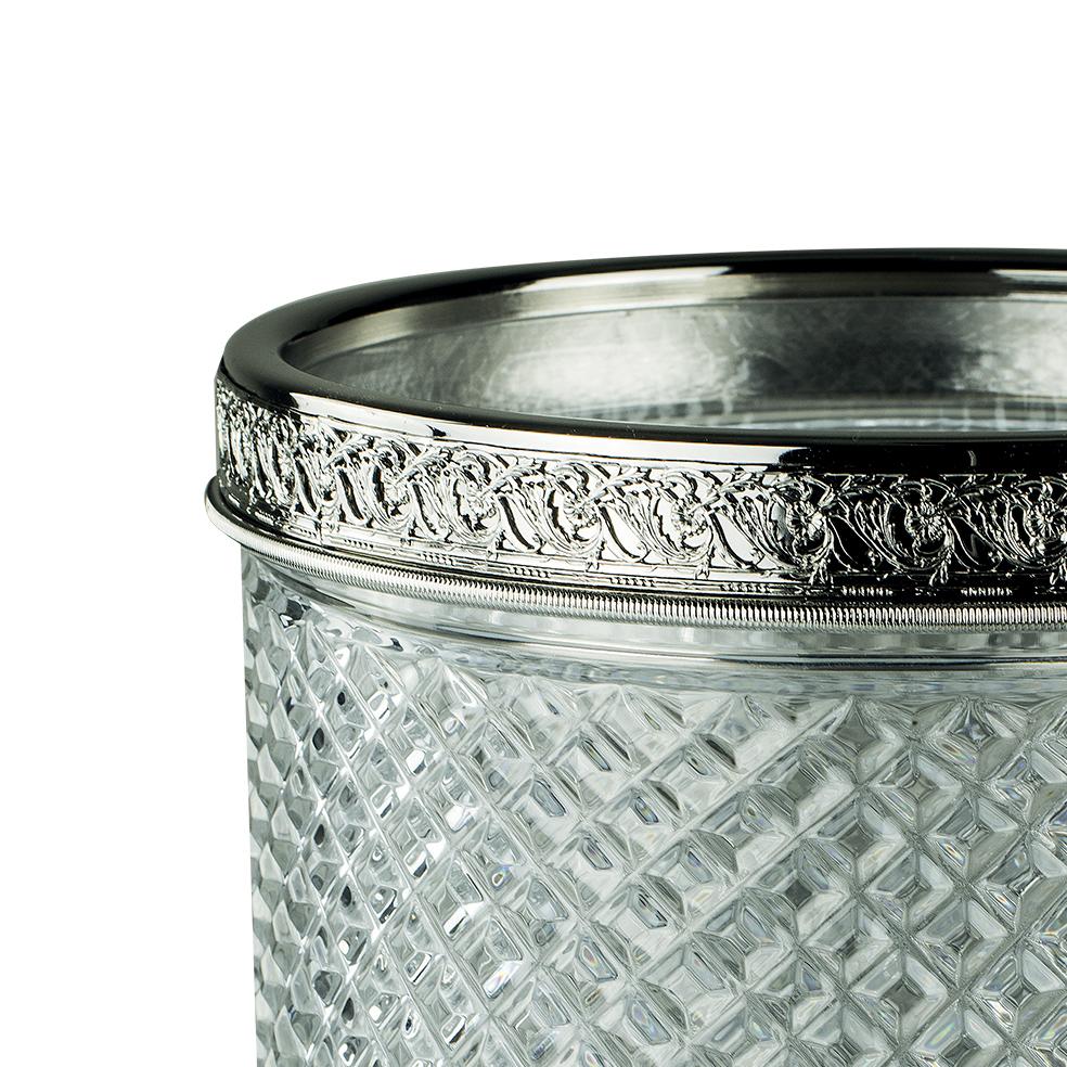 21st century hand-carved clear crystal waste-bin with chrome bronze without cover.
Each object is handcrafted and the care for every detail makes each item unique in its kind.
The style of this waste-bin  is a modern reinterpretation of an item from
