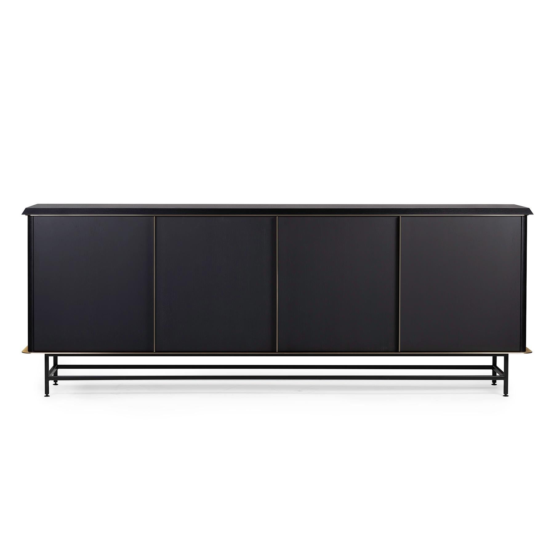 Curio is a four-door sideboard in open-pore black ash, base in black painted iron. Door profiles in burnished brass etched steel. Essential lines for a pure and refined elegance. 

Size: 242x51x90H
Designer: Stefano