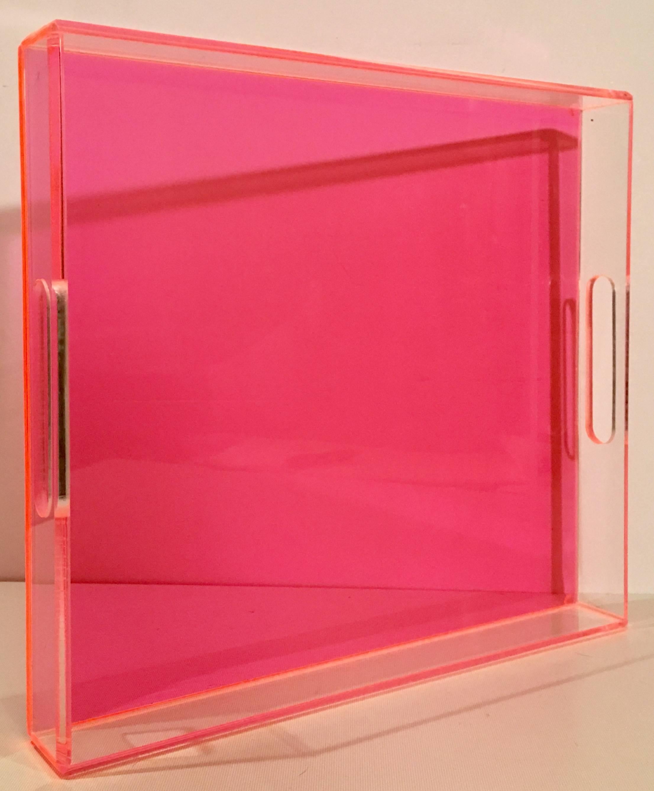 Contemporary & Custom Made in the style of Alexandra Von Furstenberg, neon pink and clear cut-out handle Lucite tray. This well constructed Lucite tray has been fabricated to the highest standard made of of thick Lucite slab. Features beveled edges,