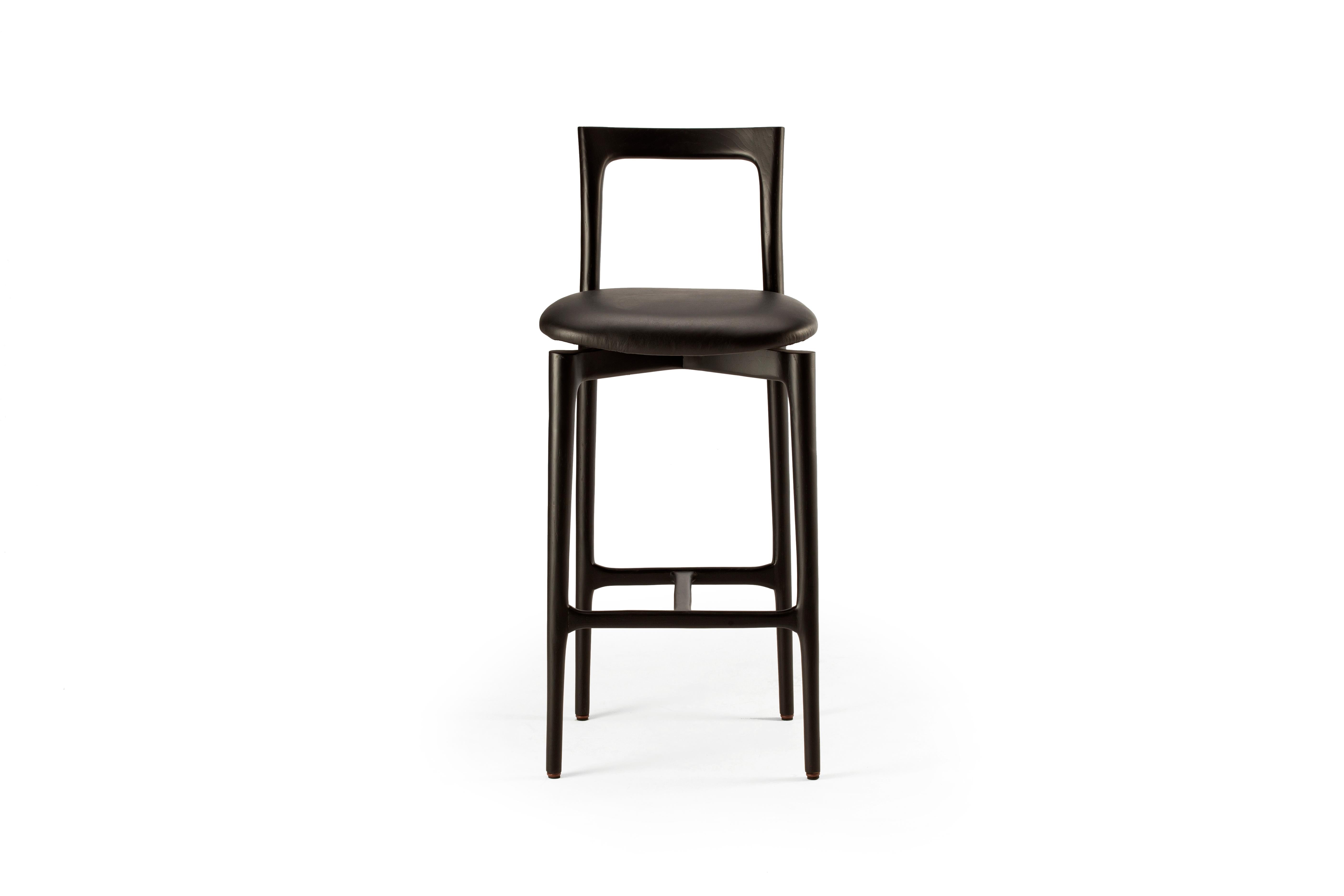 21st century Designed by Collector Studio grey bar chair leather

With a light solid wood structure, this bar chair is suitable for contemporary interiors, the bar chair’s proportions and reduction of material provides significant special