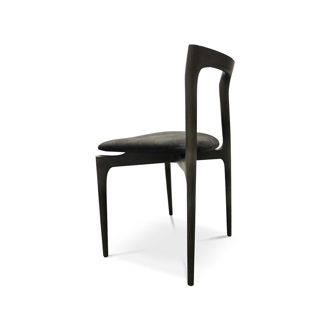 21st century designed by Collector Studio grey chair, with a light solid wood structure, this chair is suitable for contemporary interiors, the chair’s proportions and reduction of material provides significant special advantages as well as an