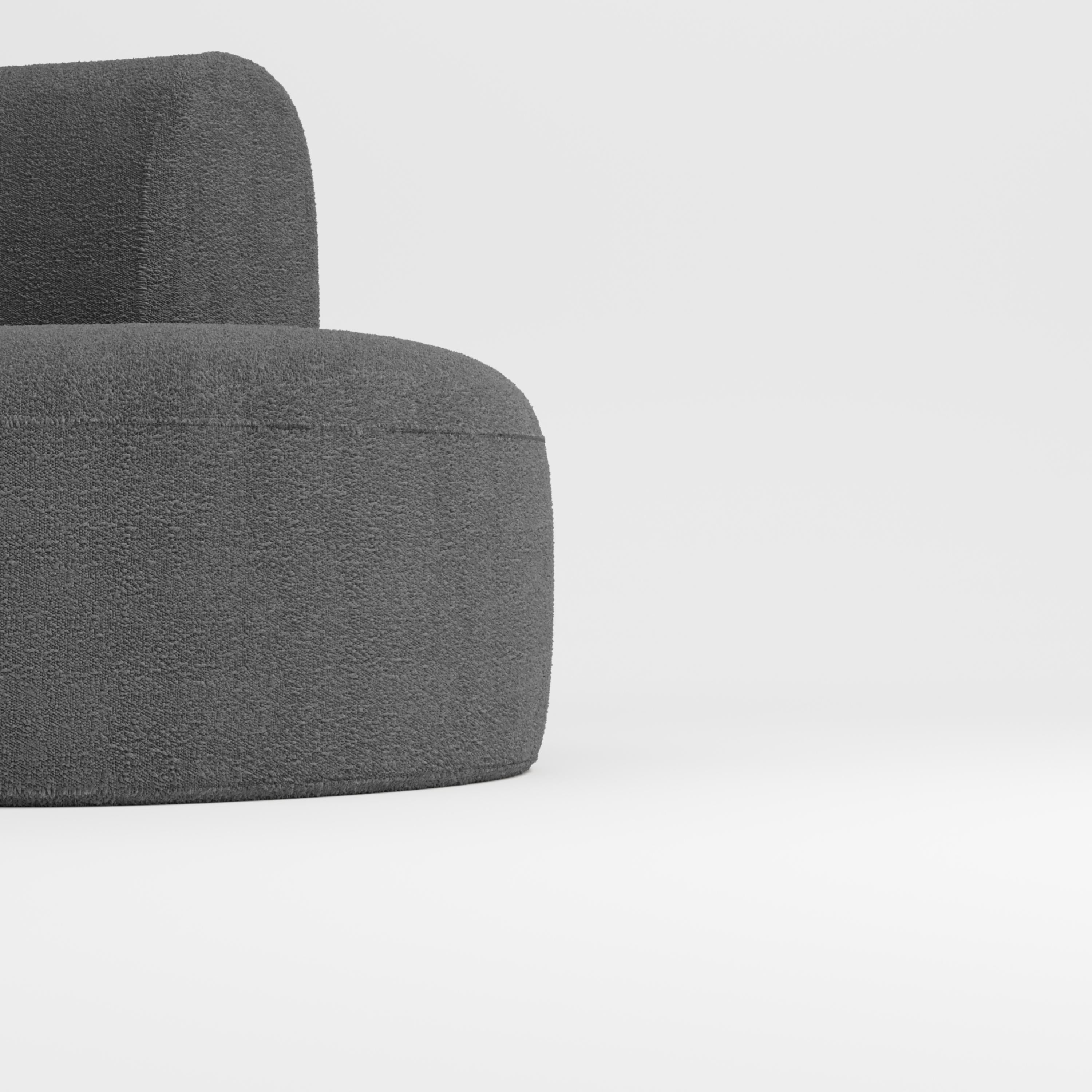 Hug sofa is defined by clean, simple lines and a distinctive armrest detail.
The armrest, half overlapping the seat cushion, creates an interlocking detail between the two elements, while the padding, firm and welcoming at the same time,