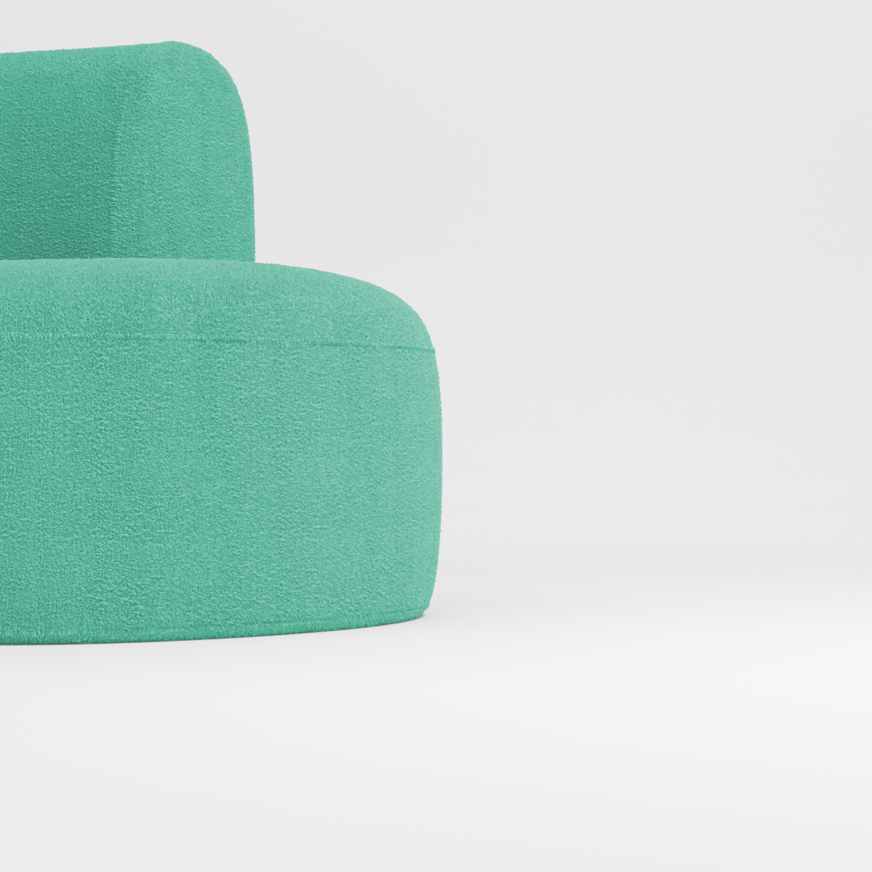 Hug sofa is defined by clean, simple lines and a distinctive armrest detail.
The armrest, half overlapping the seat cushion, creates an interlocking detail between the two elements, while the padding, firm and welcoming at the same time,