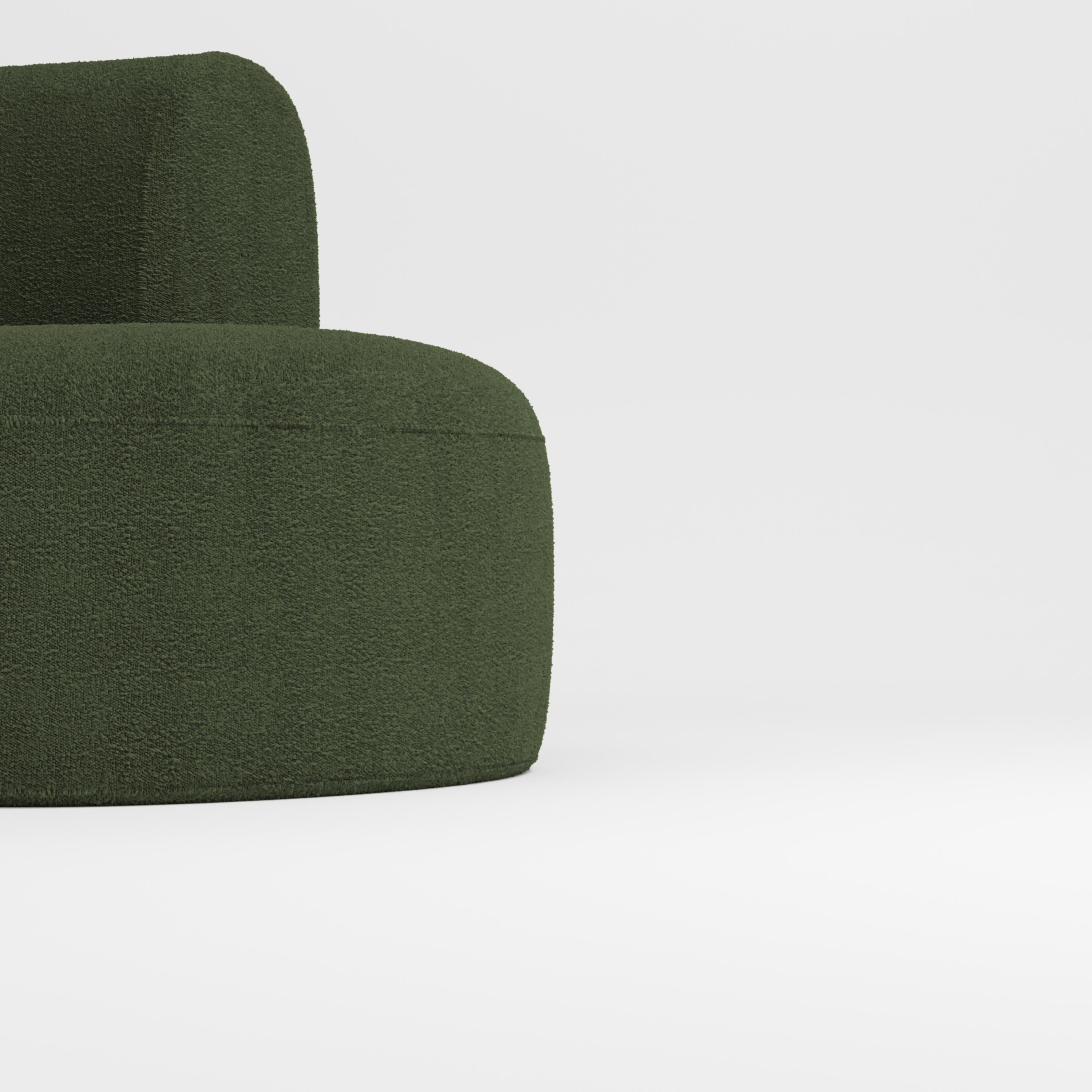 Hug sofa is defined by clean, simple lines and a distinctive armrest detail.
The armrest, half overlapping the seat cushion, creates an interlocking detail between the two elements, while the padding, firm and welcoming at the same time,
