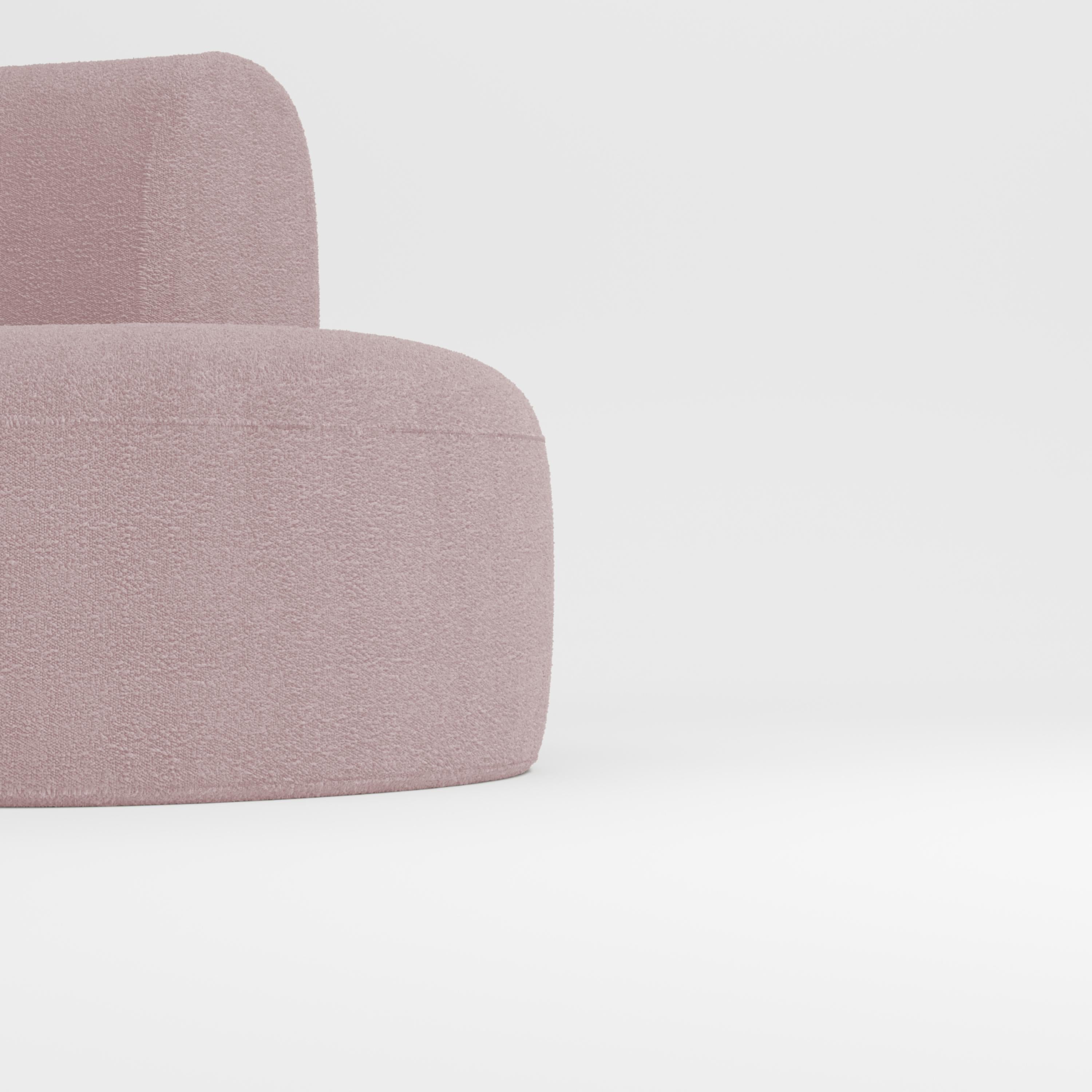 Hug sofa is defined by clean, simple lines and a distinctive armrest detail.
The armrest, half overlapping the seat cushion, creates an interlocking detail between the two elements, while the padding, firm and welcoming at the same time,