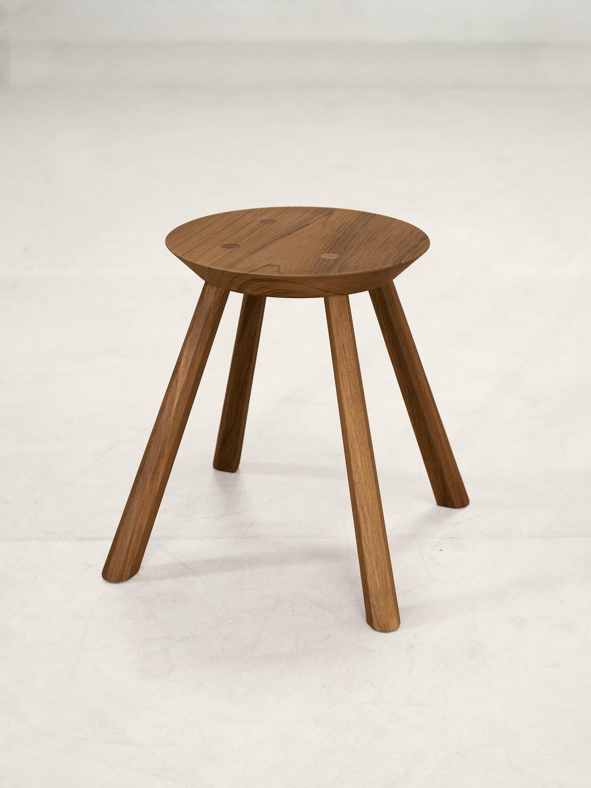 21st Century Designed Stool Teak Wood Brown


The design of the stool uses simple and strong methods of construction, relying on traditional joineries that were used before advanced technology became prevalent in woodworking. An example of this is