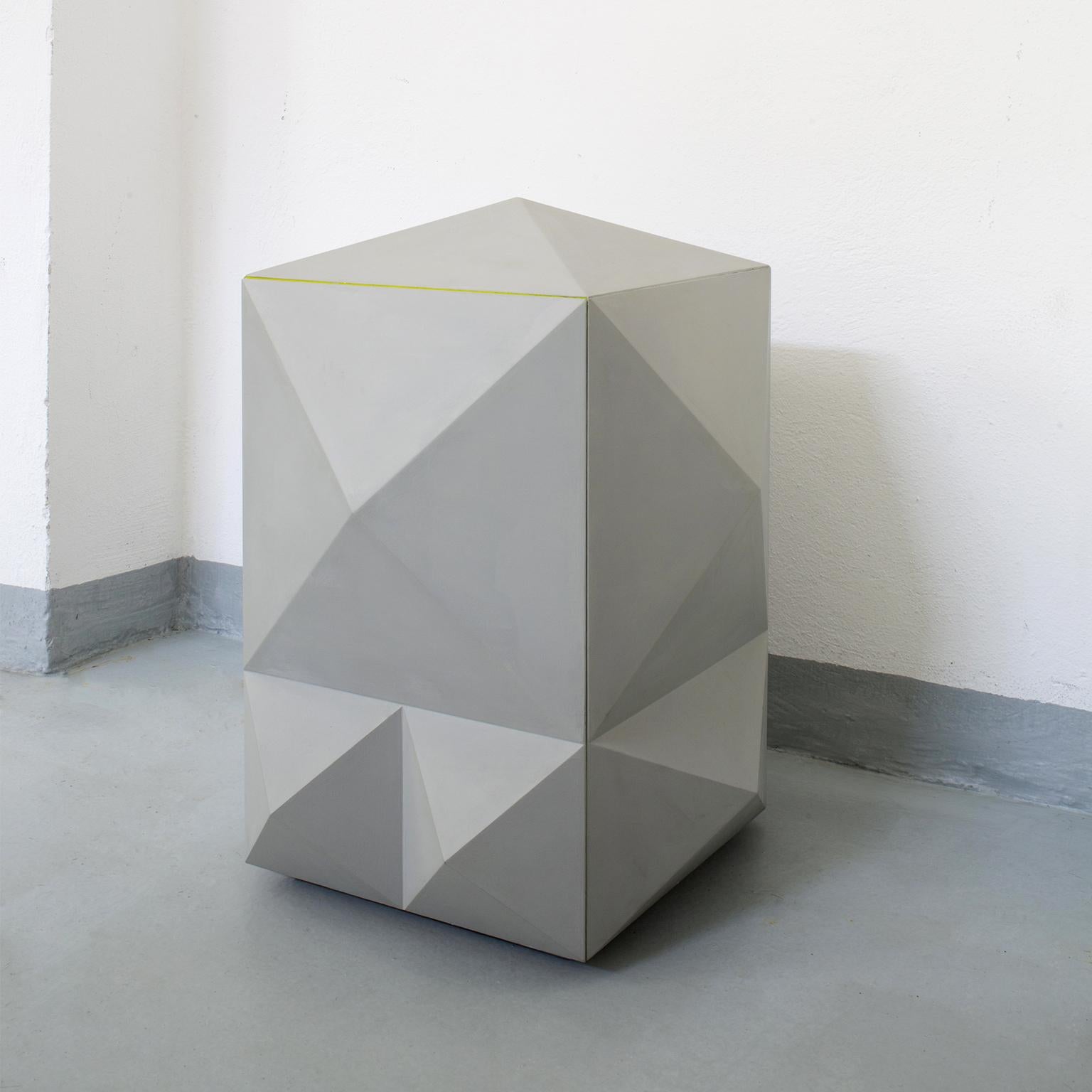 I Diamanti is a collection of hand painted cabinets, made of wood with extruded geometric shapes inspired to the Palazzo dei Diamanti in Ferrara. Each piece is an extraordinary sculpture which can be opened with an Electronic device included in a