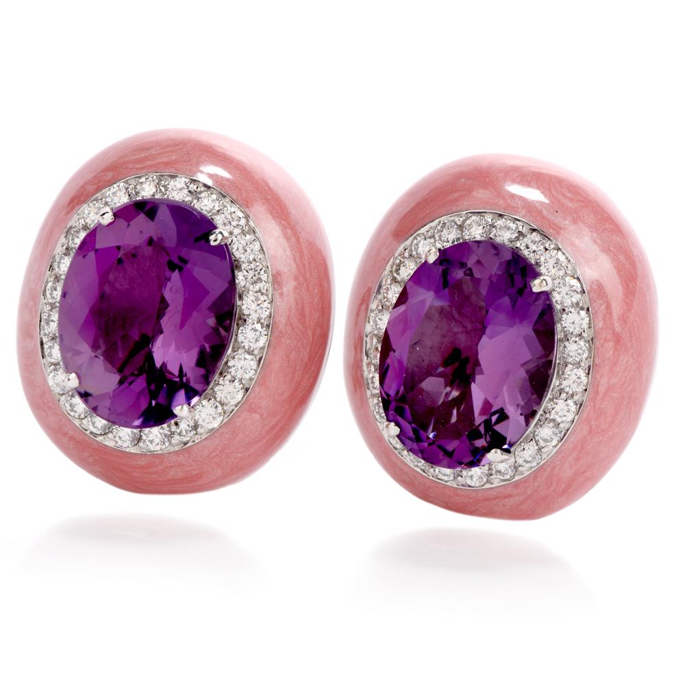 These eye catching and colorful earrings were

cast in 18K white gold.

Featured in the center of the doming foundation of pink, sparkling enamel is a large, oval

shaped Amethyst center weighing appx. 21.00 carats total.

The halo of diamonds that