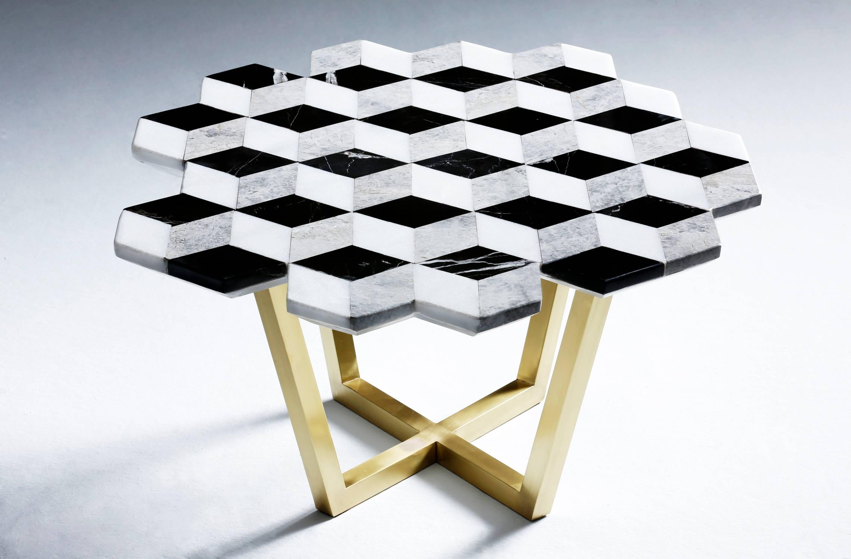 The Diplopia coffee table was conceived from the idea of creating an object that conveys an optical illusion. The stereographic effect is produced through combining different kinds of marble. The asymmetric form of the marble tabletop adds to the