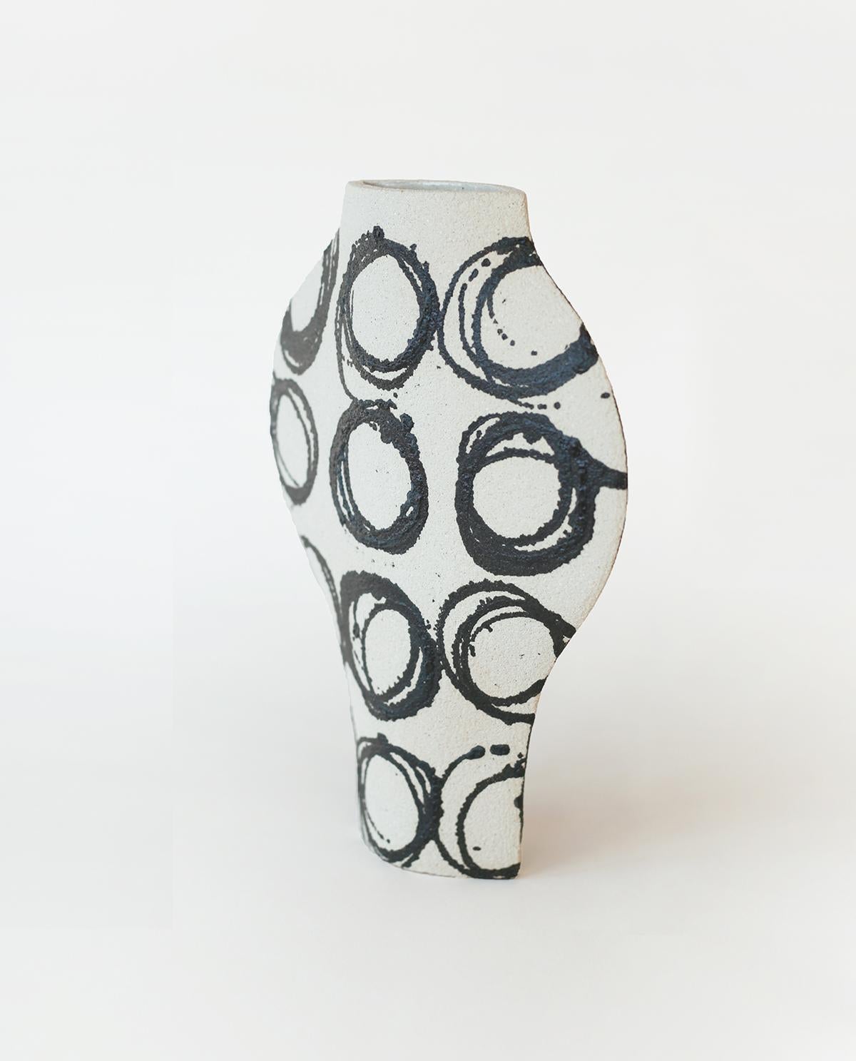 ‘Dripping Rounds' Handmade White Ceramic Vase

This vase is part of a new series inspired by iconic Art (and more precisely paintings) movements. Here is our DAL model with round motifs based on abstract paintings. They are applied to the vase