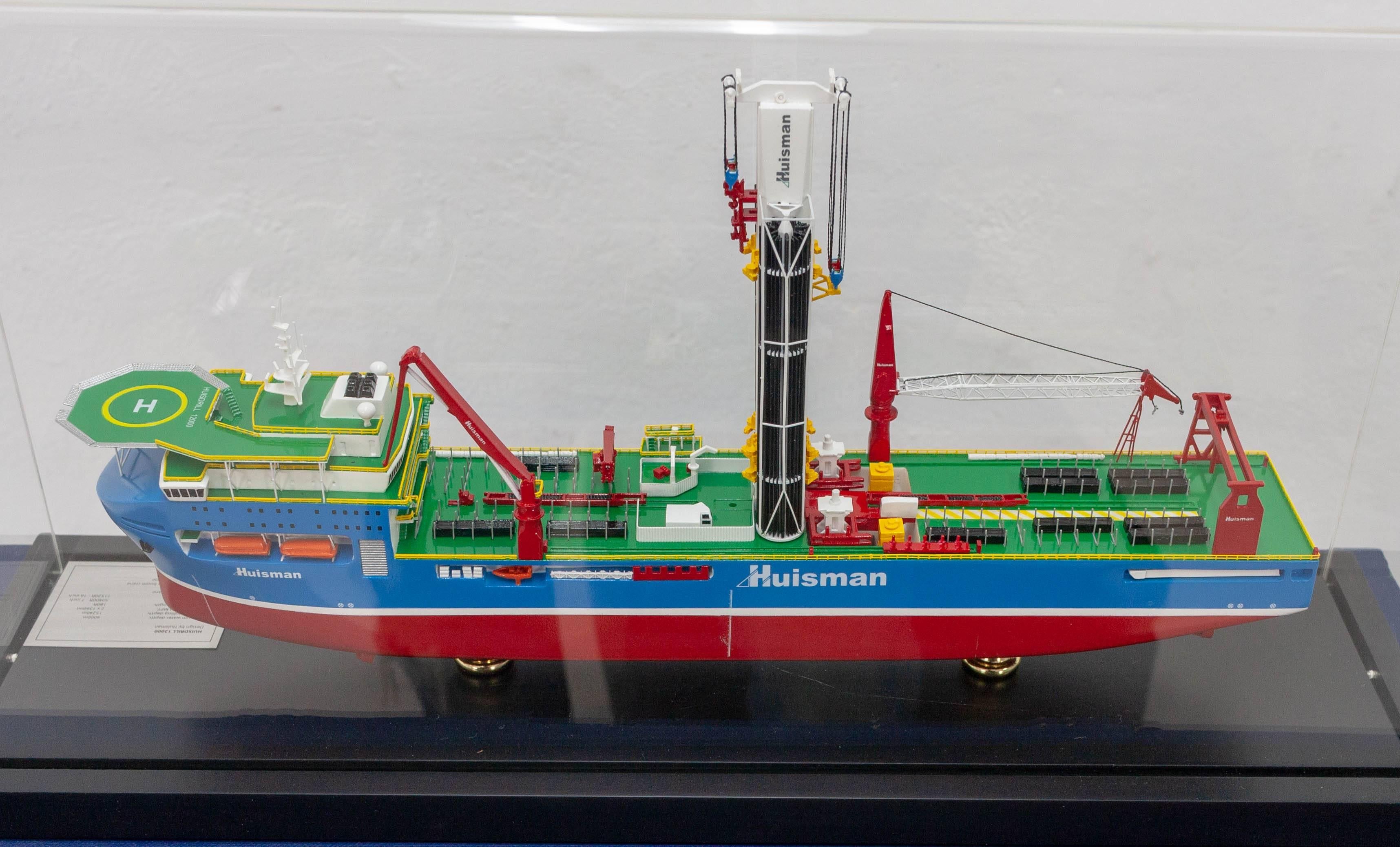 Beautifully crafted ship model made by renowned ship model makers MMCE marine and fine mechanical scale models. This model is made after the Huisman Company Huisdrill 12000 ultradeep drilling vessel in a 1:1600 scale.