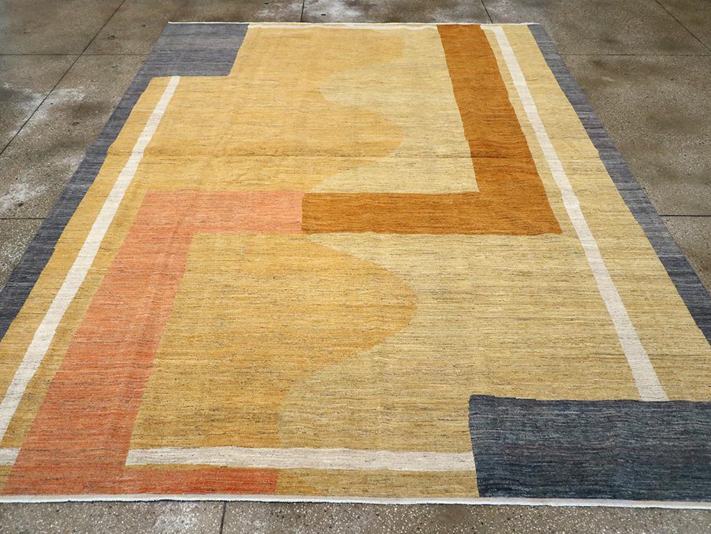 A modern East Turkestan Art Deco room size carpet handmade during the 21st century.

Measures: 9' 1