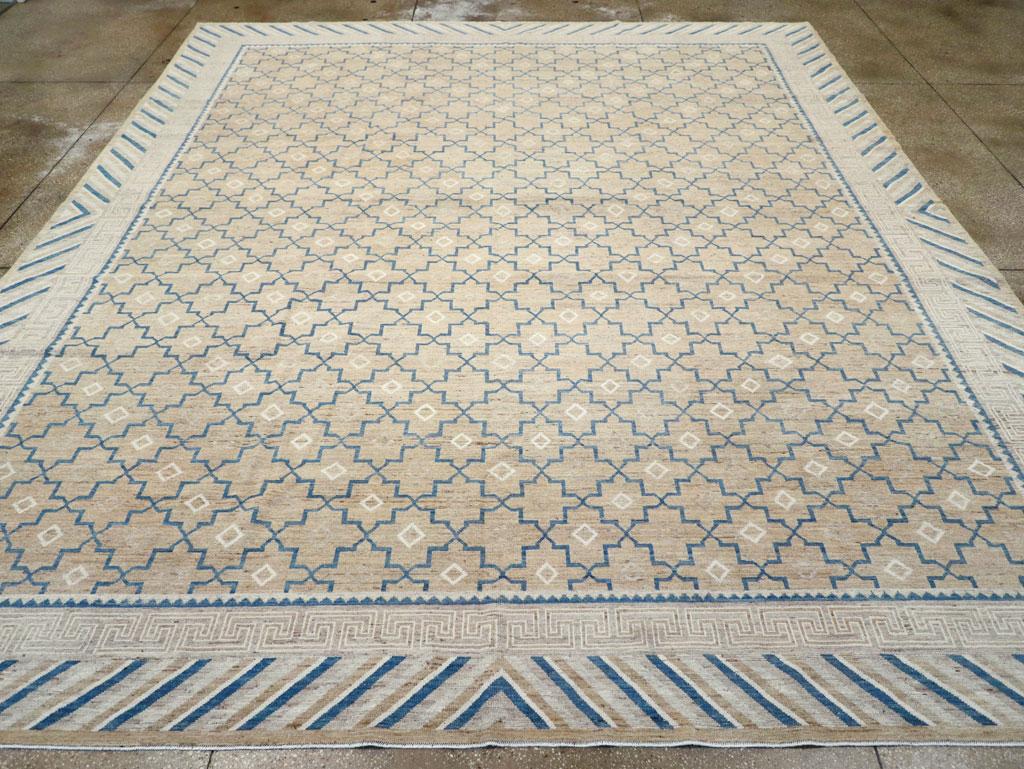 A modern East Turkestan Khotan large room size carpet handmade during the 21st century.

Measures: 12' 3