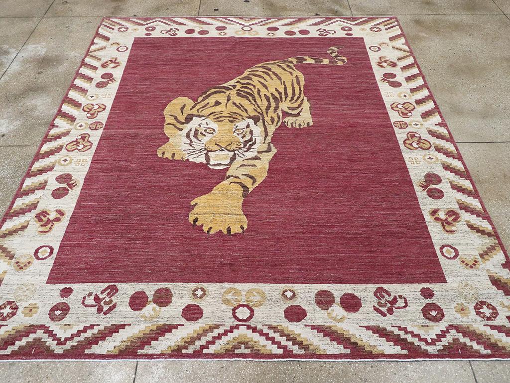 A modern East Turkestan Khotan pictorial room size carpet handmade during the 21st century.

Measures: 8' 10
