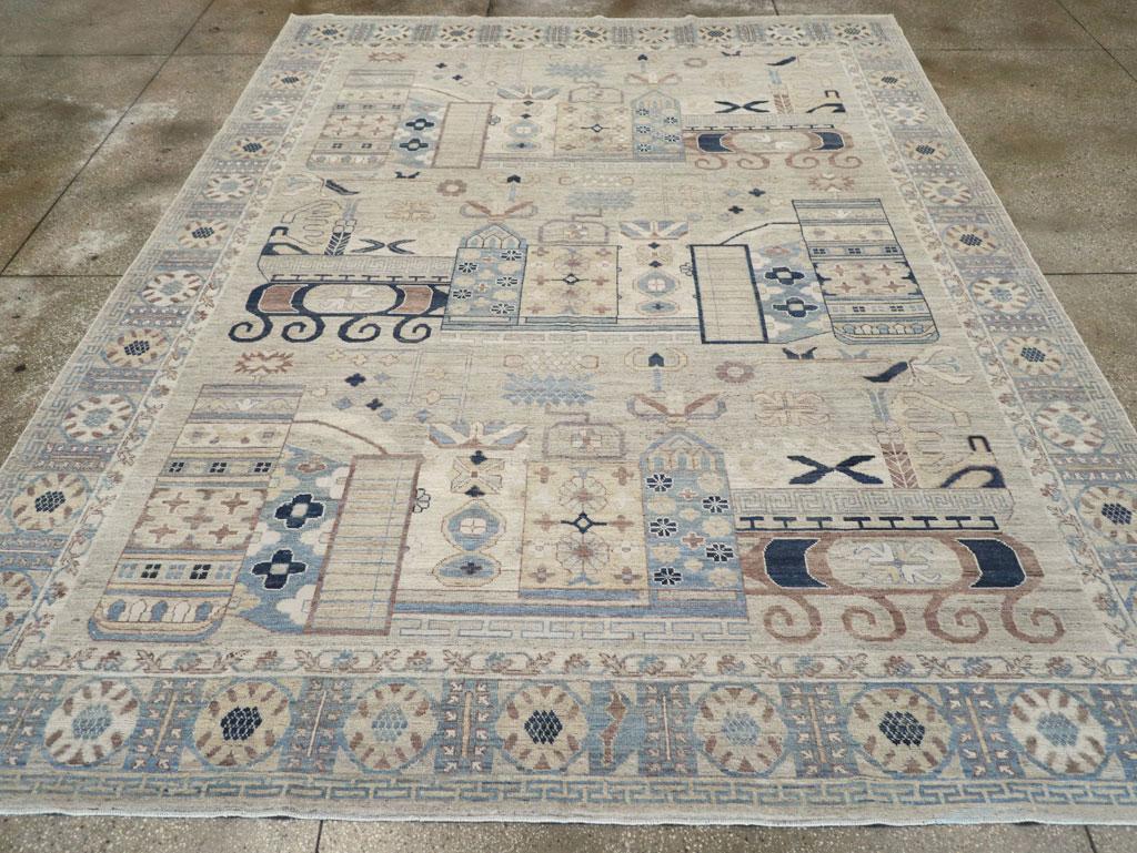 Tapis moderne du Turkestan oriental Khotan, fabriqué à la main au cours du 21e siècle.

Mesures : 9' 9