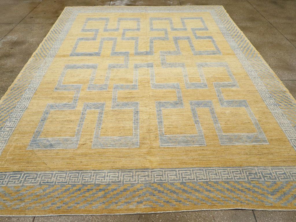Tapis moderne du Turkestan oriental Khotan, fabriqué à la main au cours du 21e siècle.

Mesures : 10' 1