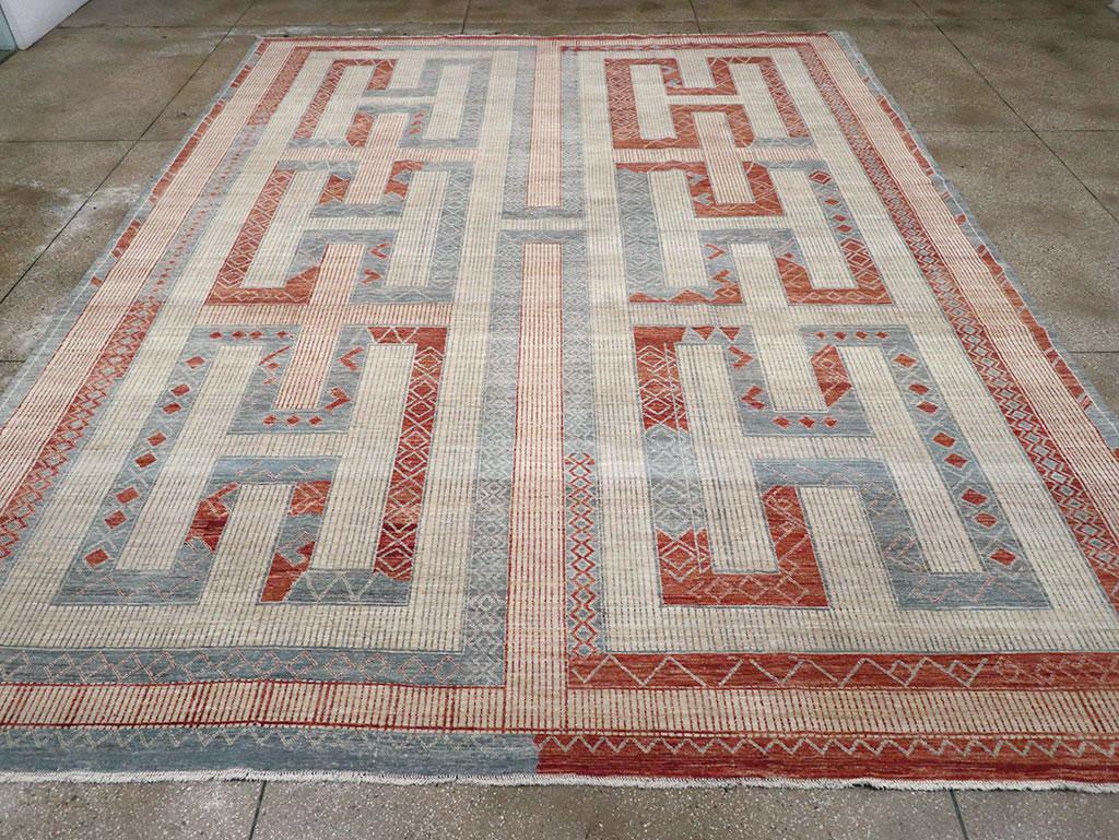Tapis moderne du Turkestan oriental Khotan, fabriqué à la main au cours du 21e siècle.

Mesures : 11' 6