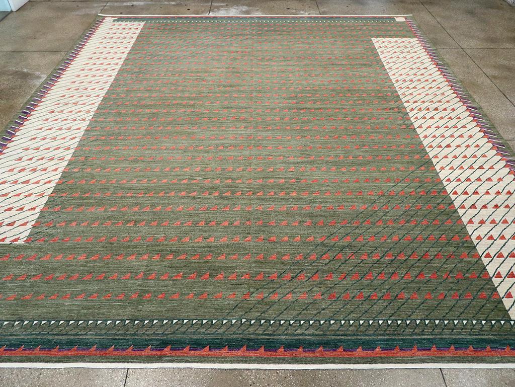 A East Turkestan Khotan modern large room size carpet handmade during the 21st century.

Measures: 13' 2