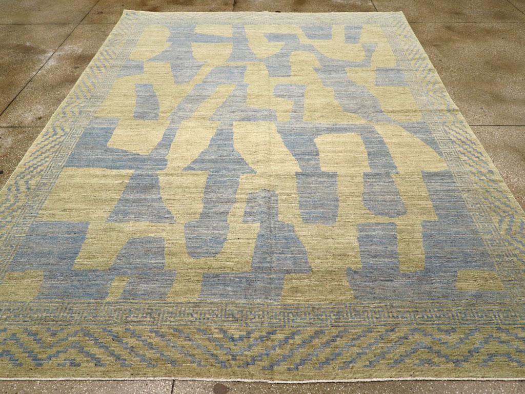 Tapis moderne du Turkestan oriental Khotan, fabriqué à la main au cours du 21e siècle.

Mesures : 8' 10