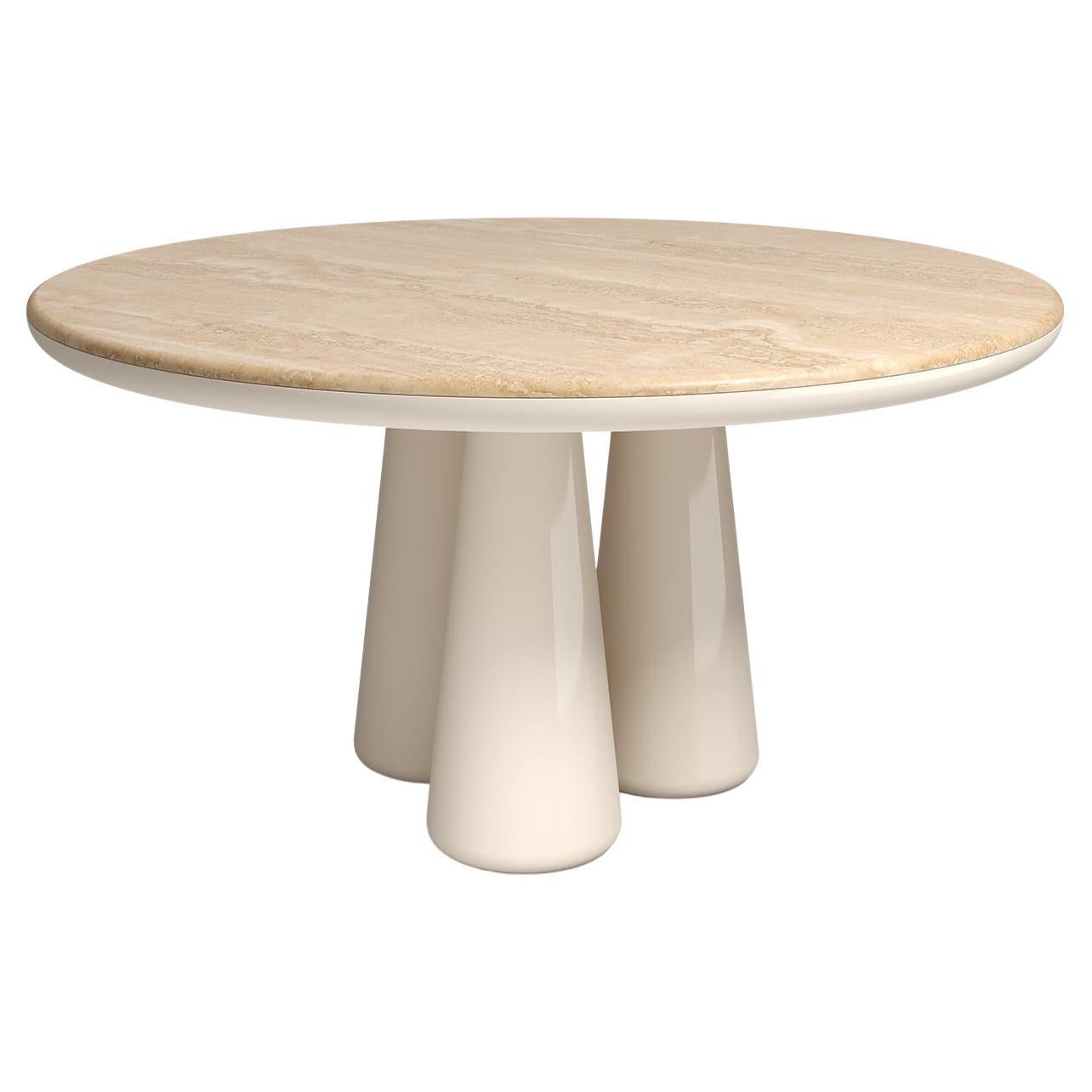 Isotopo table design by Elena Salmistraro, product by Scapin Collezioni
Limited Edition

A vibrant round top is combined with a sculptural base made of three rounded conical supports that give the product a strong