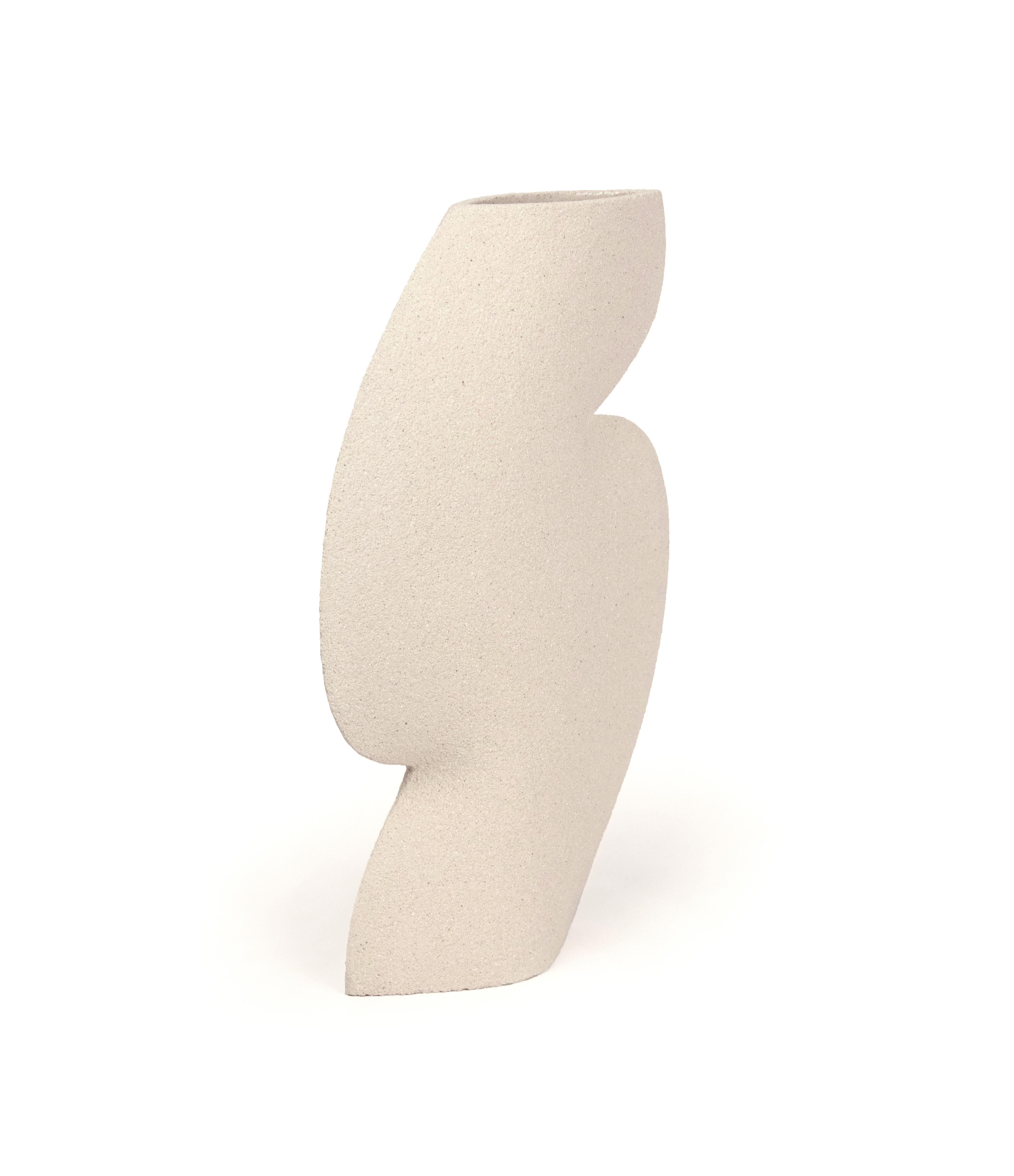 ELLIPSE N°3 - White

Measures: H: 25.5 cm / L: 17 cm
H: 10 Inch. / L: 6.6 Inch.

- Stoneware fired at high temperature finished with transparent glossy glaze inside.
- Raw exterior showcasing the natural aspect of the clay’s texture.
-
