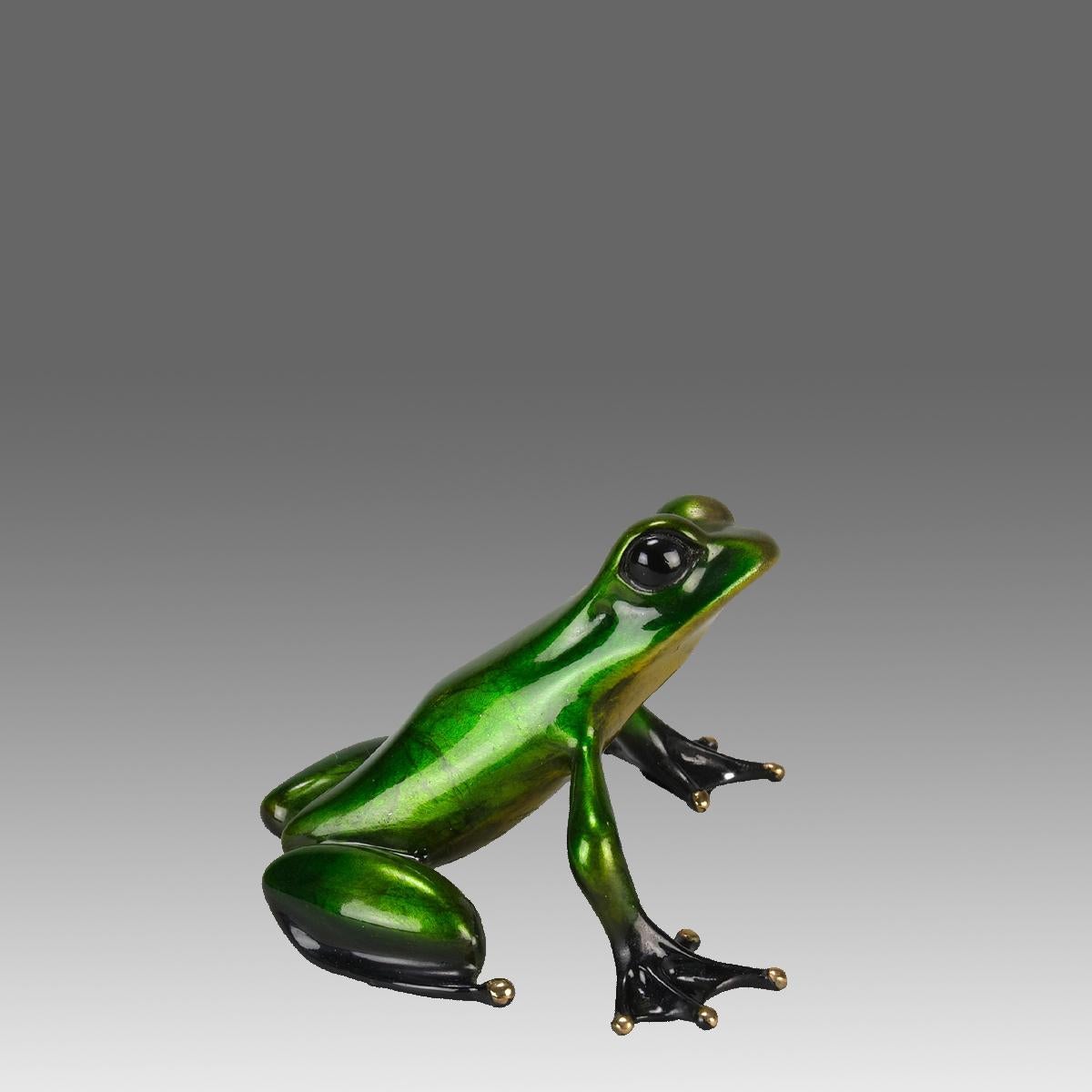 Une belle étude en bronze en édition limitée d'une grenouille vert métallique en position assise, avec de très belles couleurs émaillées et une excellente surface tactile, signée Tim, estampillée 