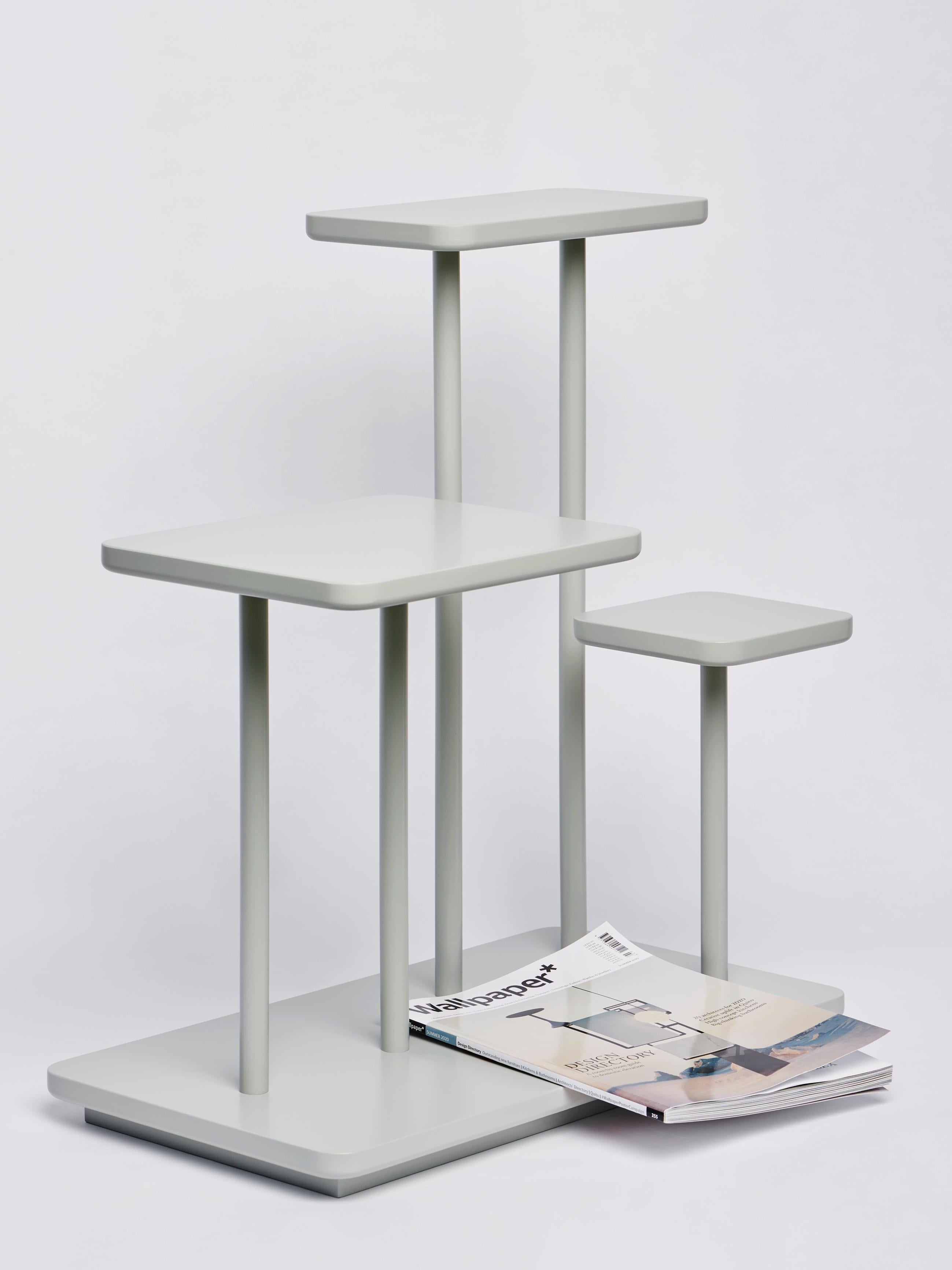 The end table “Isolette” is a part of the “Isole” family of Atelier Ferraro. It displays a similar design principle as the coffee table “Isole”, on a smaller scale, to serve either as an accent beside a couch or an armchair – or as a repository in