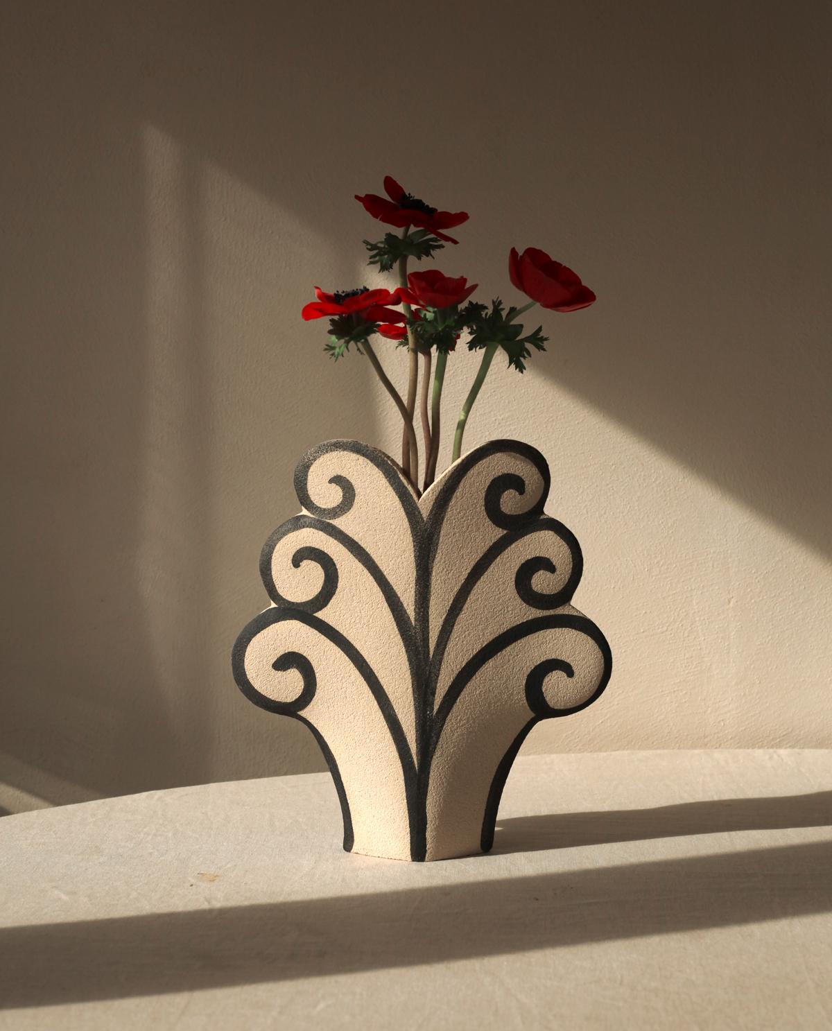 A part of a captivating new line blending ancient Greek pottery with contemporary design, the ‘Fern’ vase showcases delicate black underglaze illustrations that harmonize traditional and modern aesthetics.
Crafted by our designer, the blue