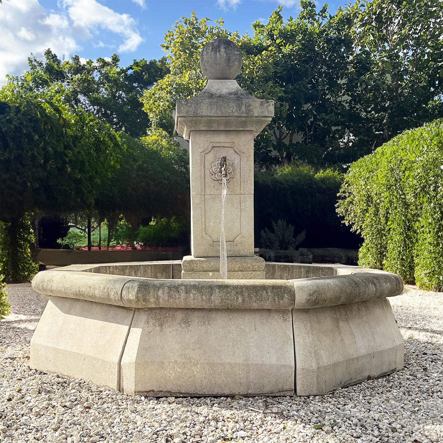 The very traditional octagonal garden fountain was hand carved in limestone after an 18th century original (fountain du reservoir) and can still be seen nowadays in the French villages. This Provencal water fountain has a square paneled central