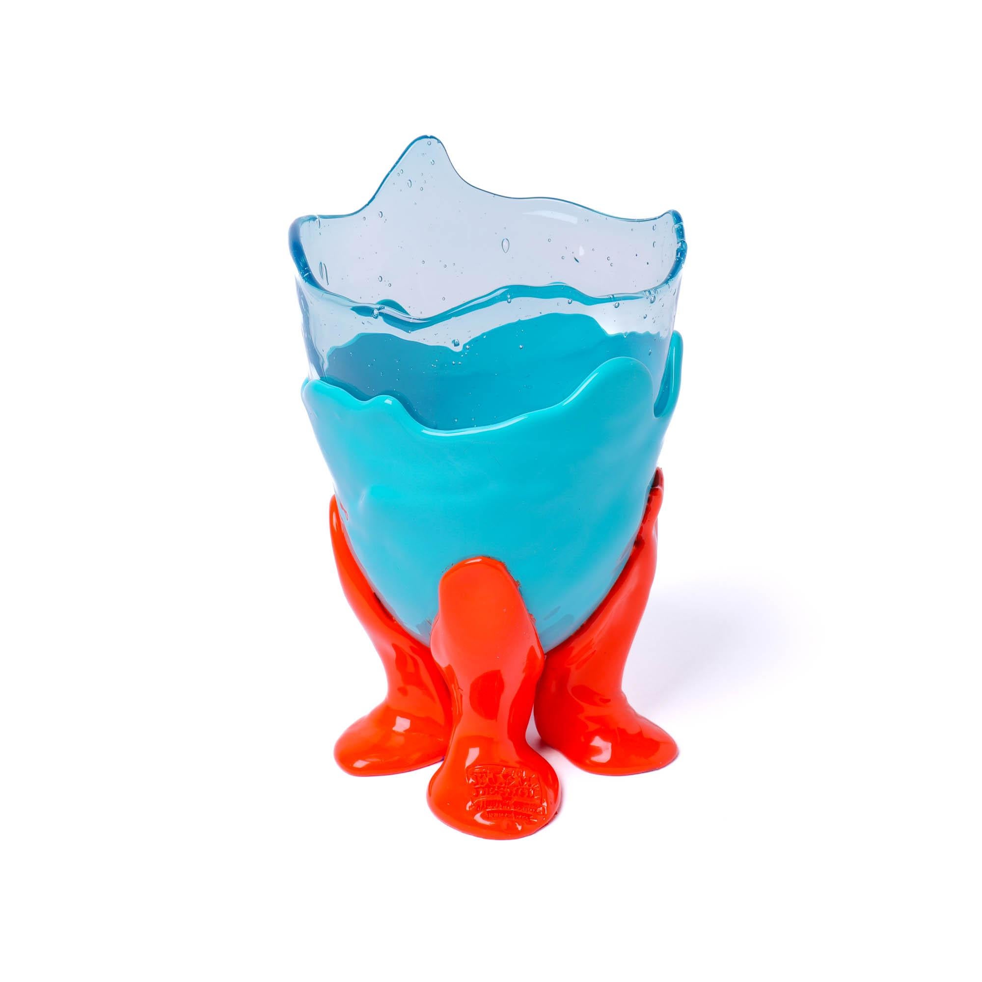 Clear extra colour vase - clear aqua, matt turquoise, matt orange.
Vase in soft resin designed by Gaetano Pesce in 1995 for Fish Design collection.

Measures: M - Ø 16cm x H 26cm
Colours: clear aqua, matt turquoise, matt orange.
Material: RESIN
Vase