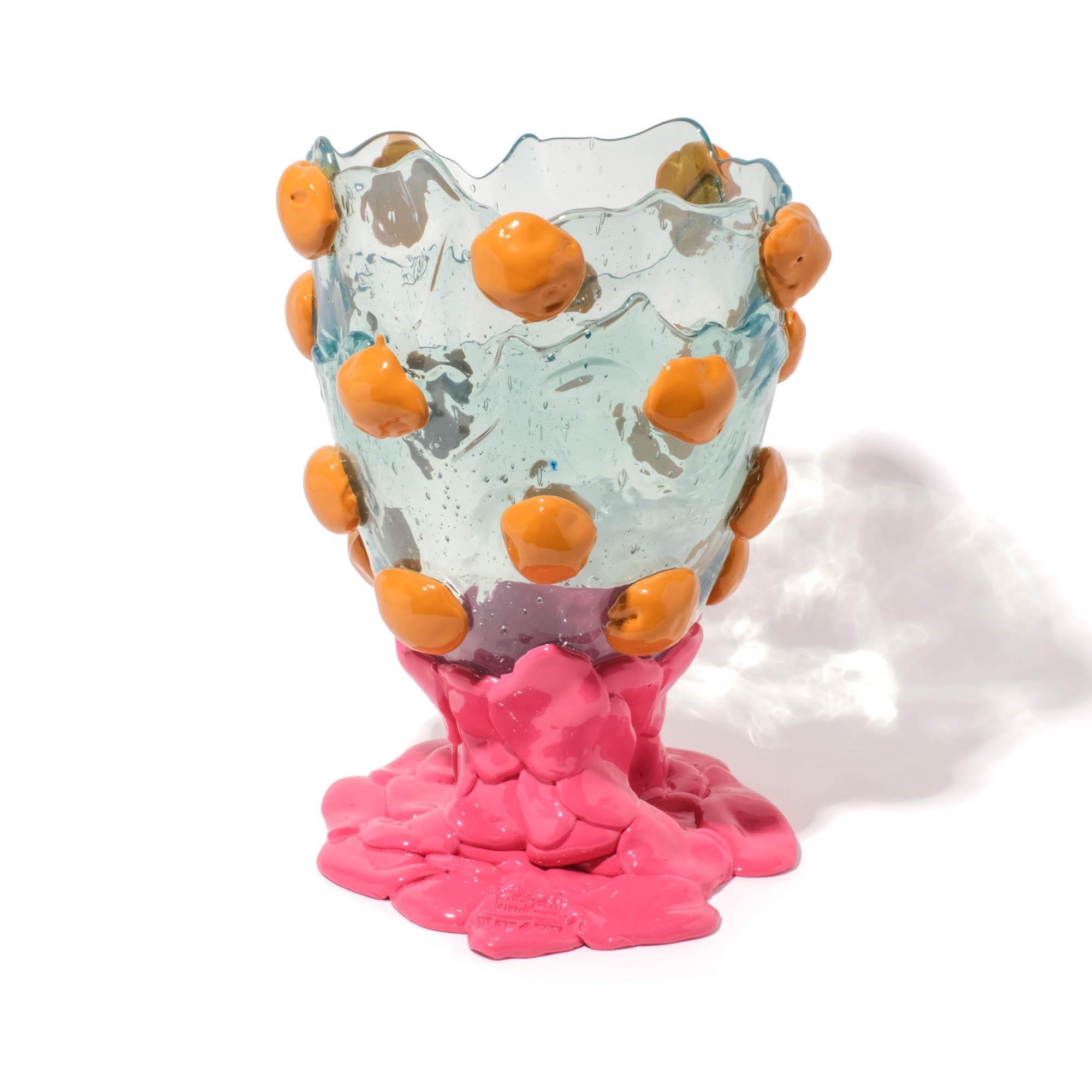 Nugget vase, Clear Aqua, Ochre, Fuchsia
Vase in soft resin designed by Gaetano Pesce in 1995 for Fish Design collection.

Measures: L - Ø 22cm x H 36cm
Colours: Clear Aqua, Ochre, Fuchsia
Material: RESIN
Vase in soft resin designed by Gaetano Pesce