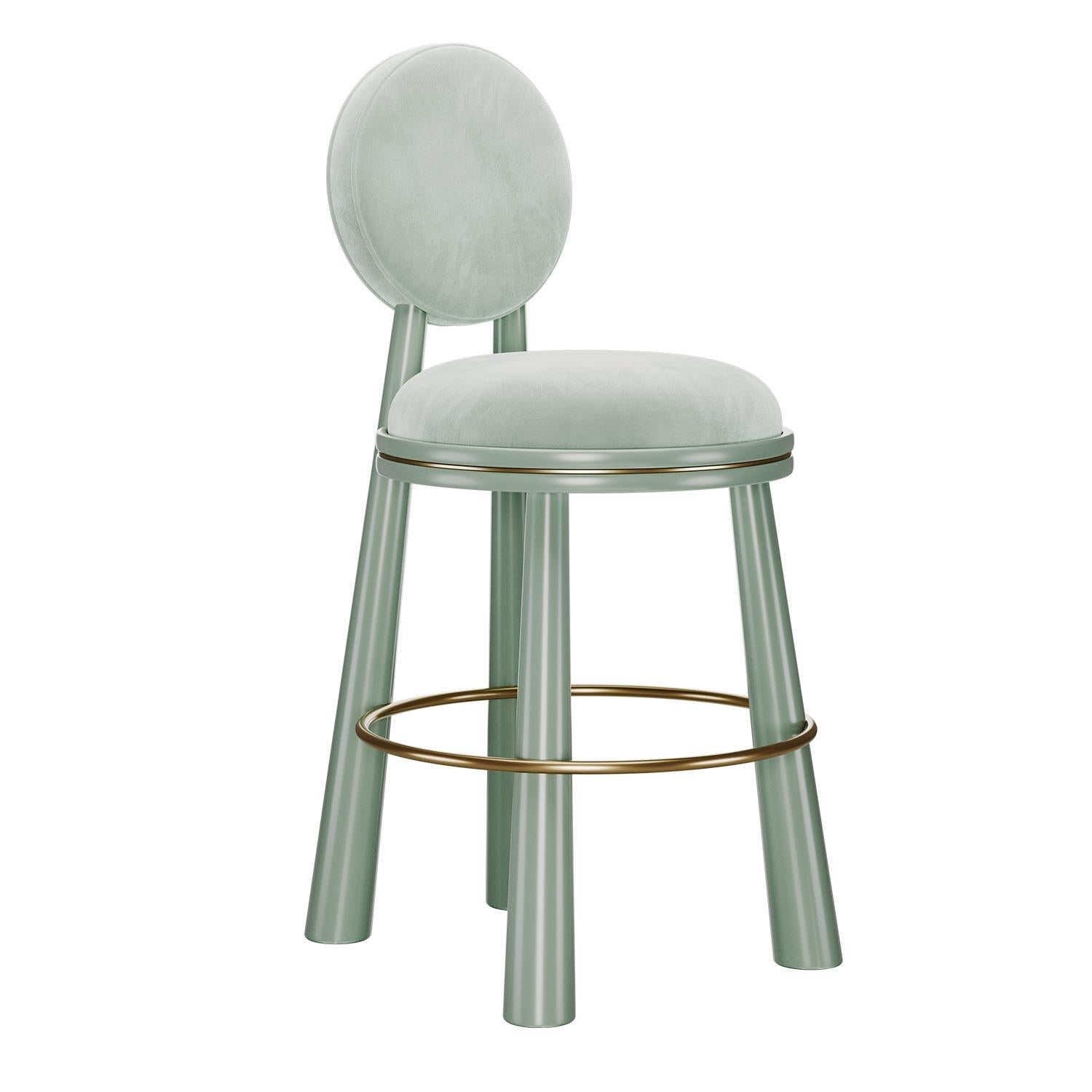 Showcasing a bold yet harmonious silhouette, the Mouline Bar Stool brings a touch of excitement and whimsy to any bar setting. The backrest echoes the circular seat shape, creating a cohesive visual rhythm. Robust, turned legs give Mouline a
