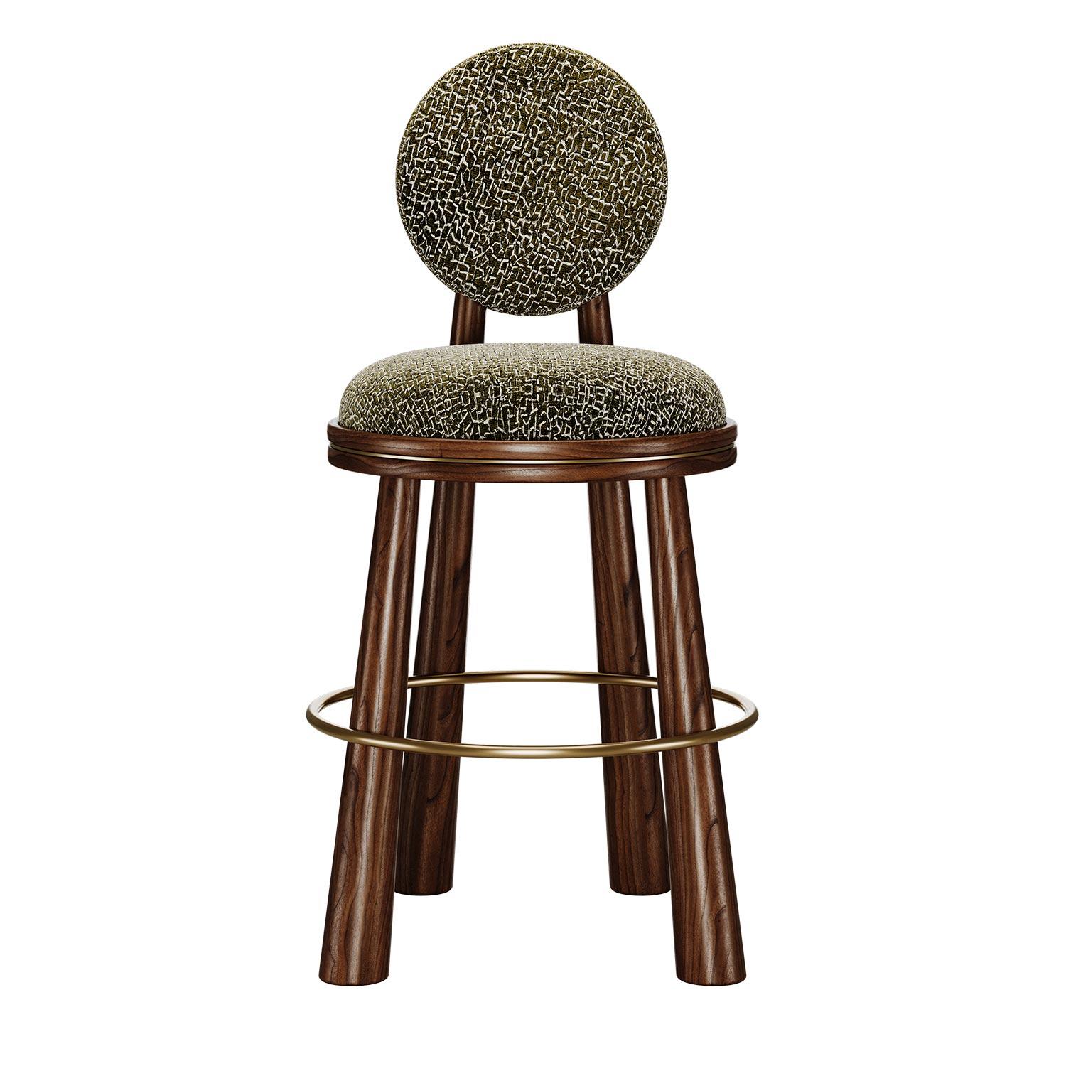 Showcasing a bold yet harmonious silhouette, the Mouline Bar Stool brings a touch of excitement and whimsy to any bar setting. The backrest echoes the circular seat shape, creating a cohesive visual rhythm. Robust, turned legs give Mouline a